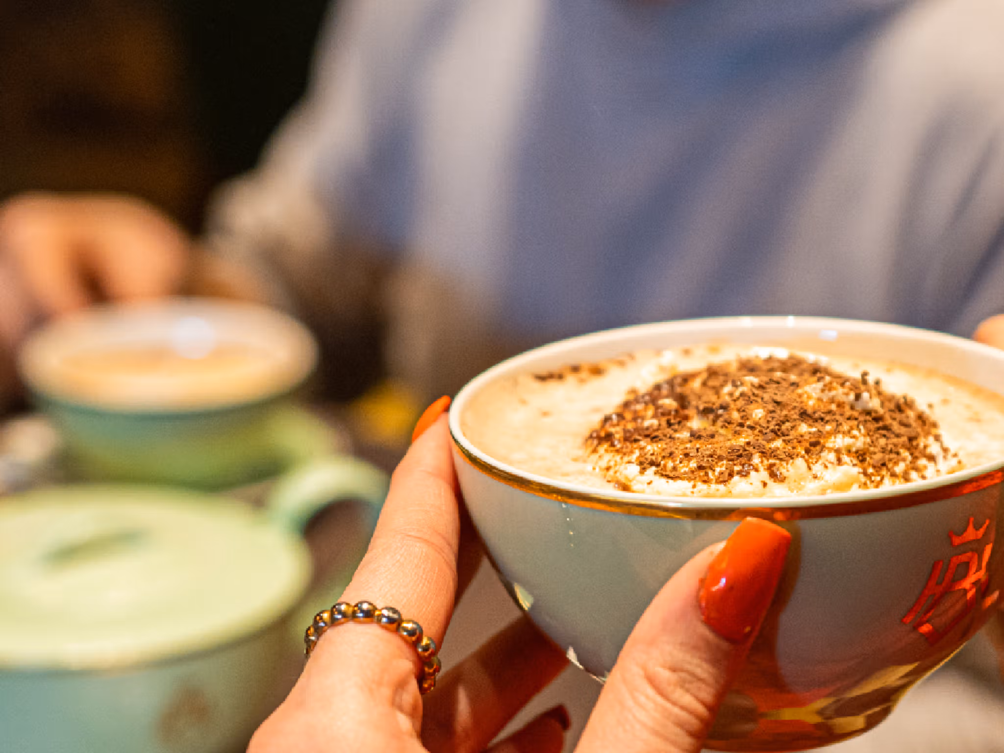 People drinking hot chocolate.