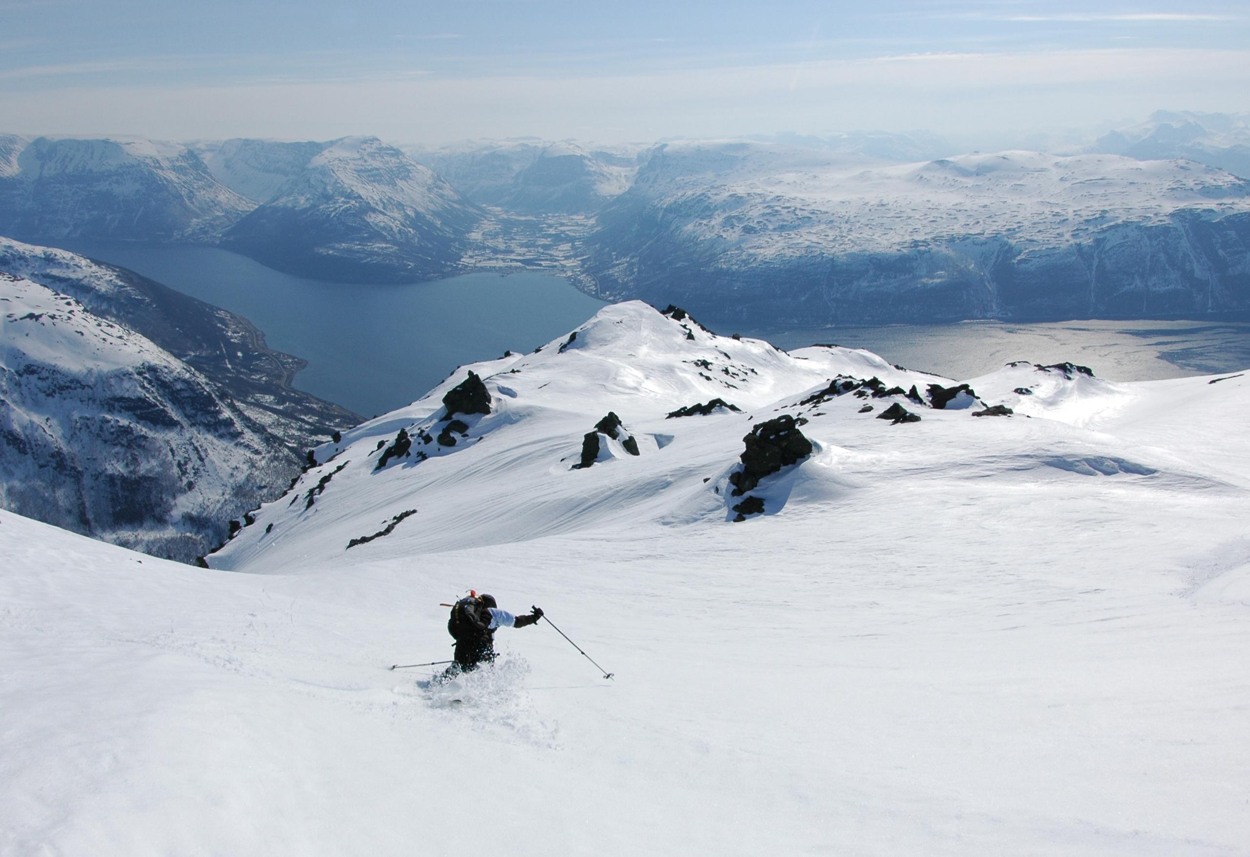 A person freeriding in the Lyngen alps