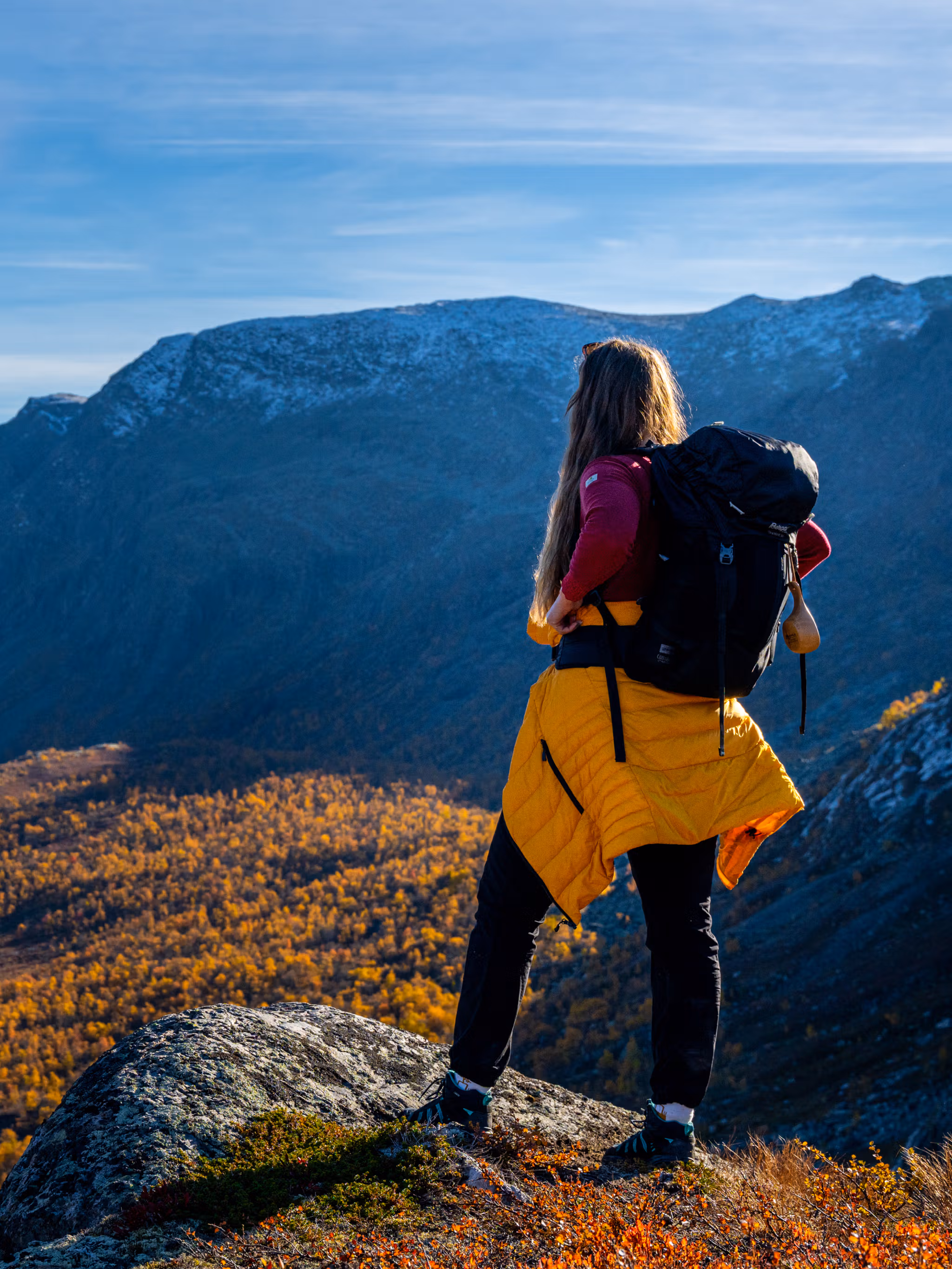 Woman enjoying the autumn view of Hydalen in Hemsedal