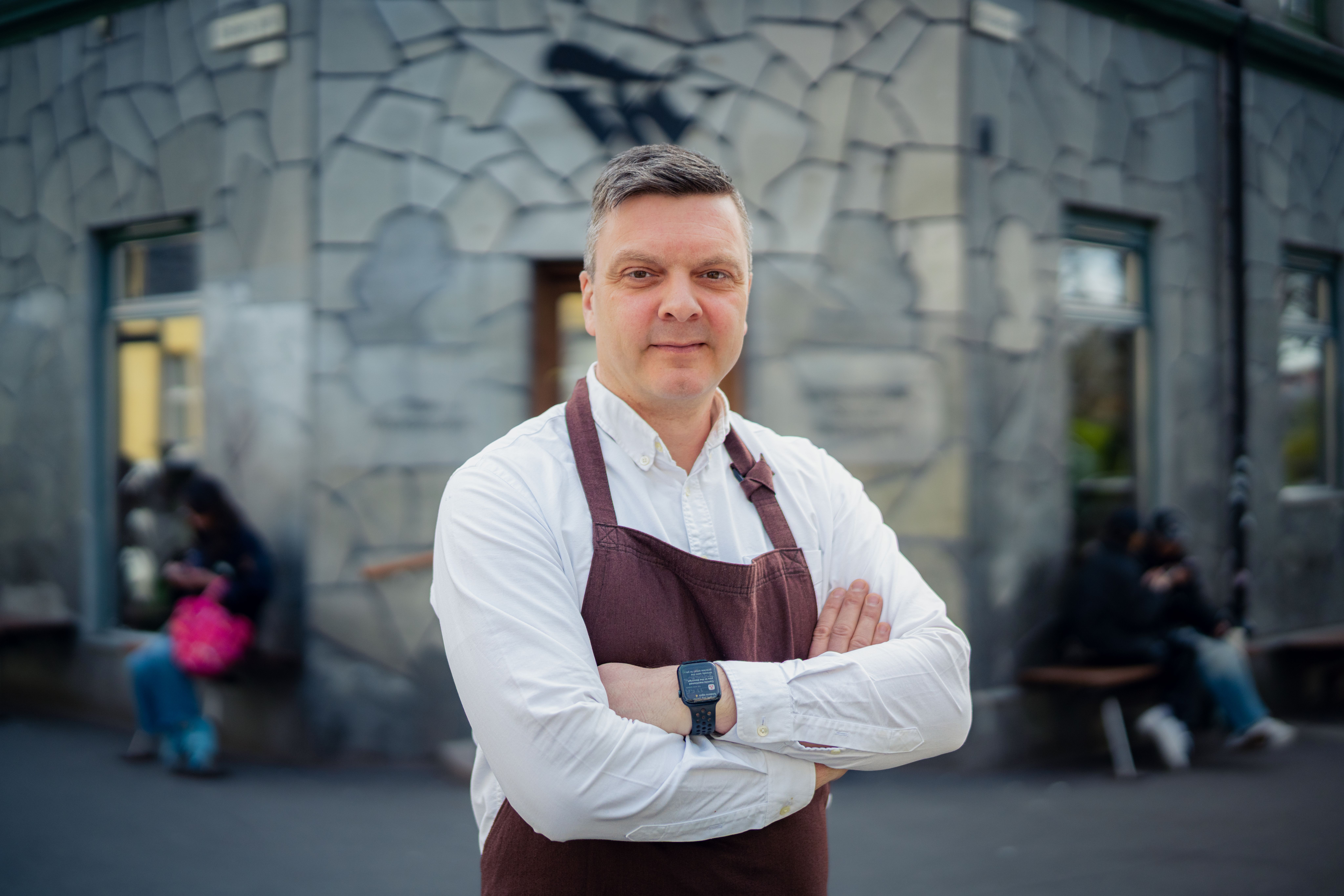 Portrait of Tim Wendelboe outside his cafe at Løkka