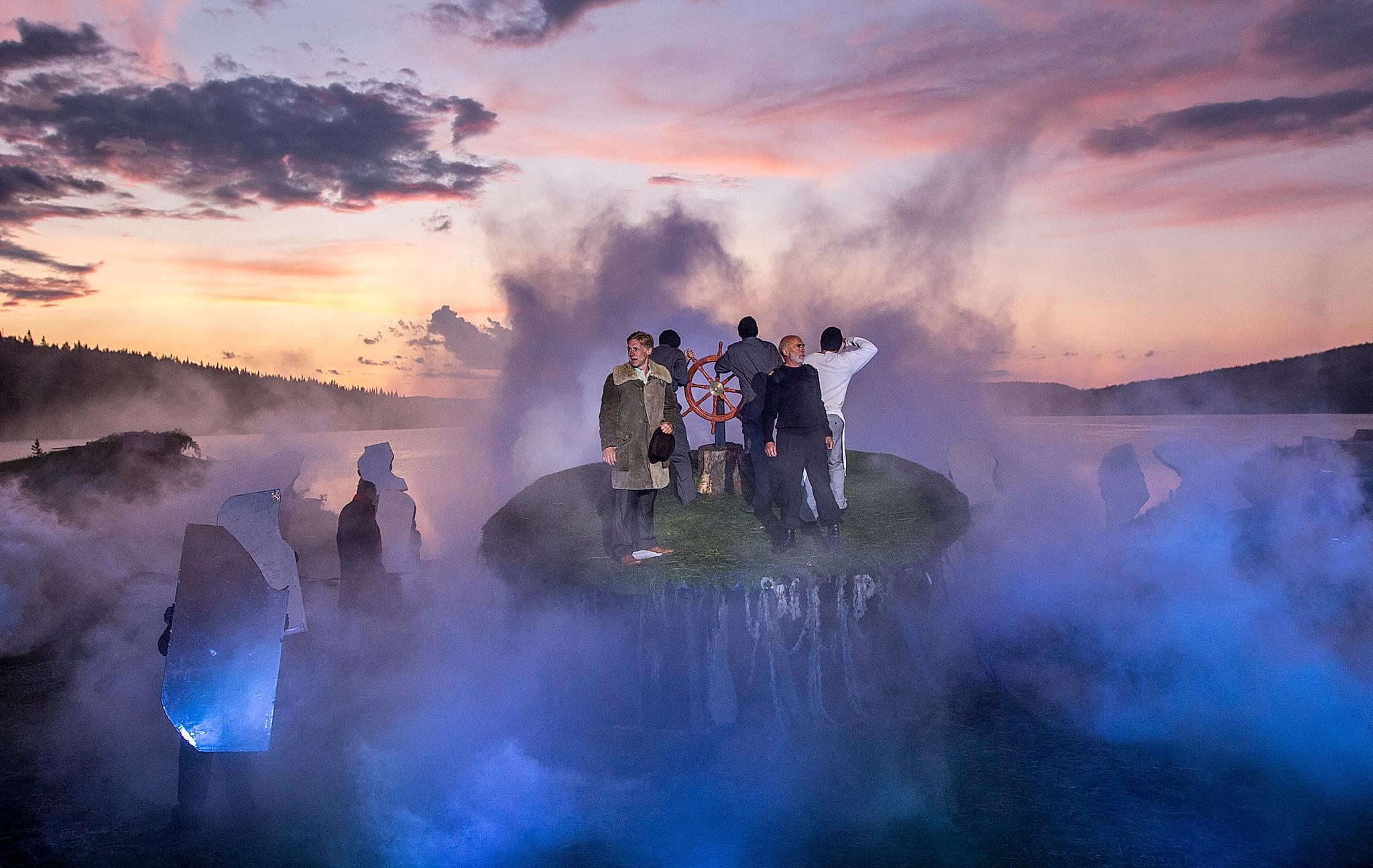Multiple actors on stage, surrounded by smoke at the Peer Gynt Festival, Gålå, Eastern Norway