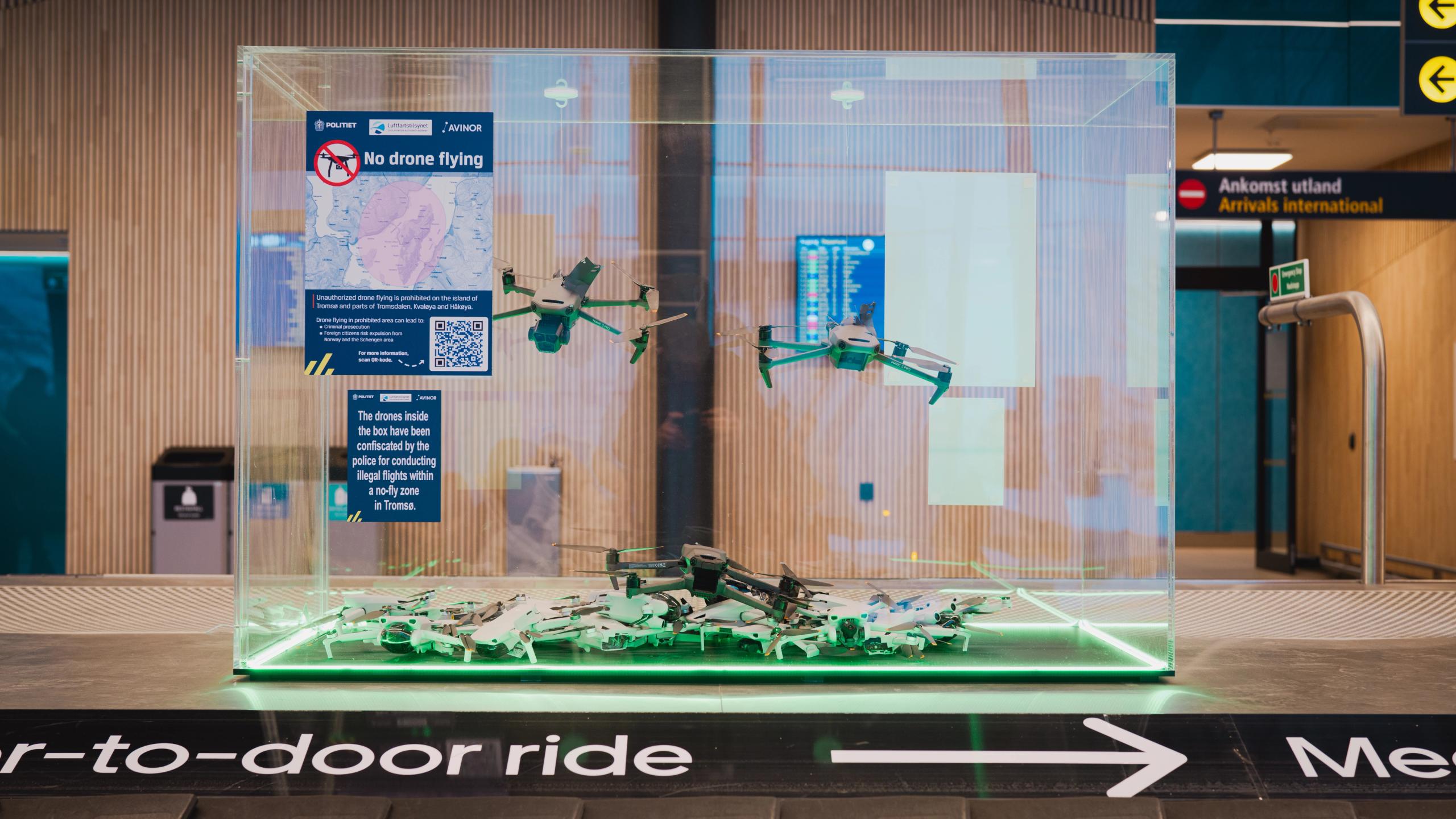 Drones in a cage in the Tromsø airport.