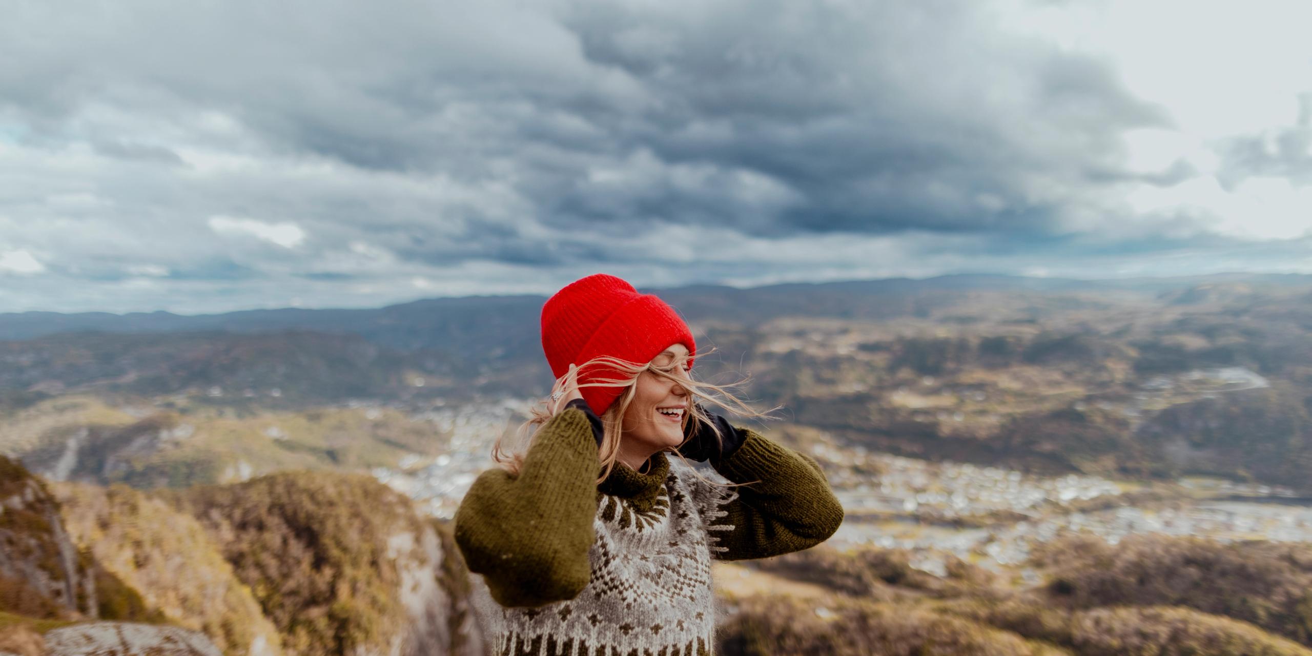 A woman on a mountain in the autumn in Kvinesdal