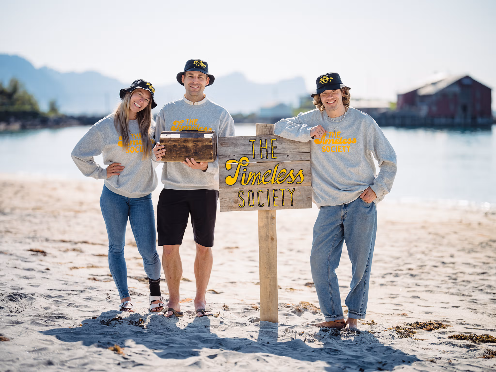 Visitors by sign that says Timeless Society in Senja