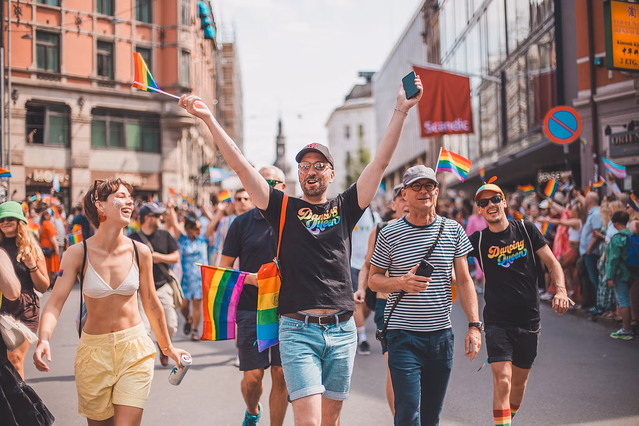 Happy people marching at the Oslo Pride parade, in 2023