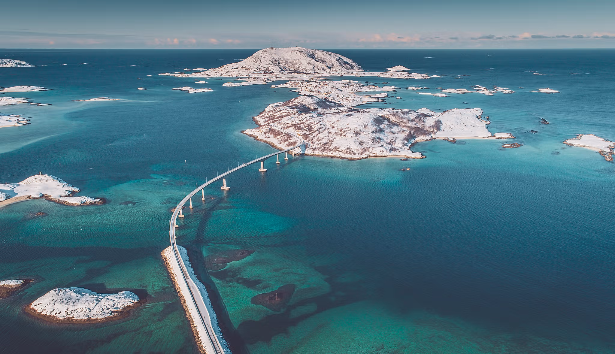 A bird's view of the bridge leading out to the island of Sommarøy by Tromsø in winter