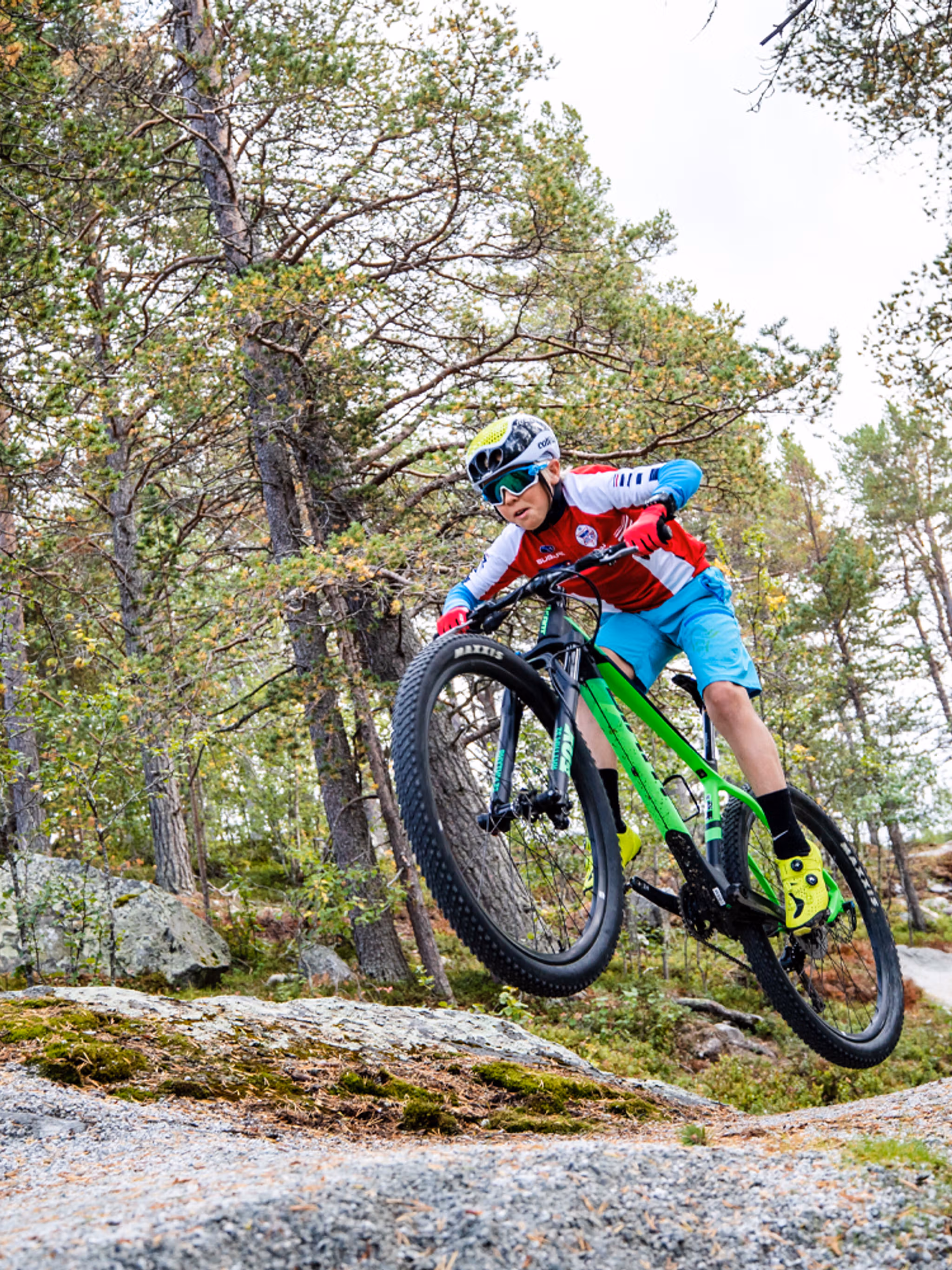 A child mountain biking in Geilo bike park in Hallingdal, Eastern Norway