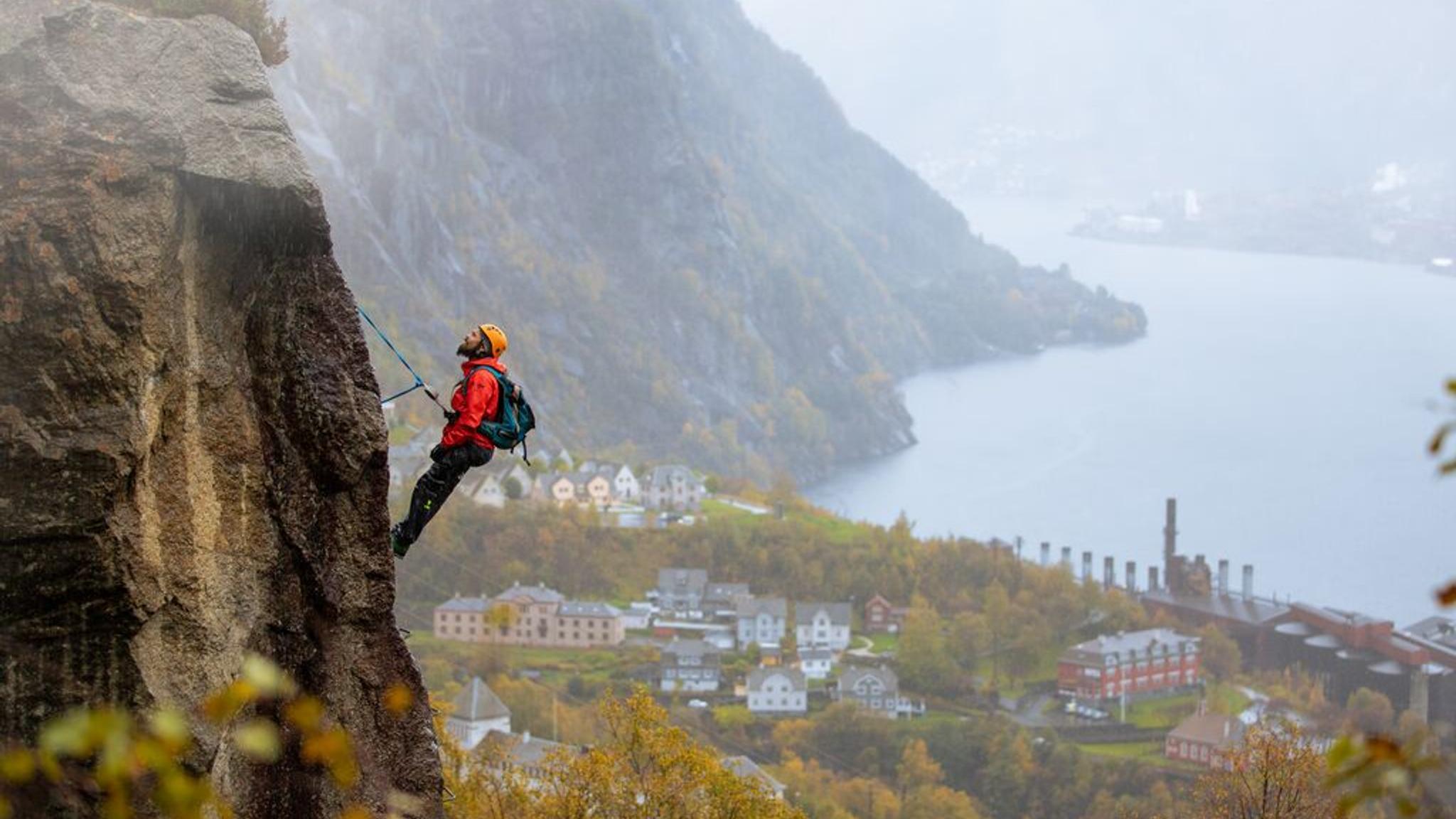 Man climbing via ferrata Tyssedal