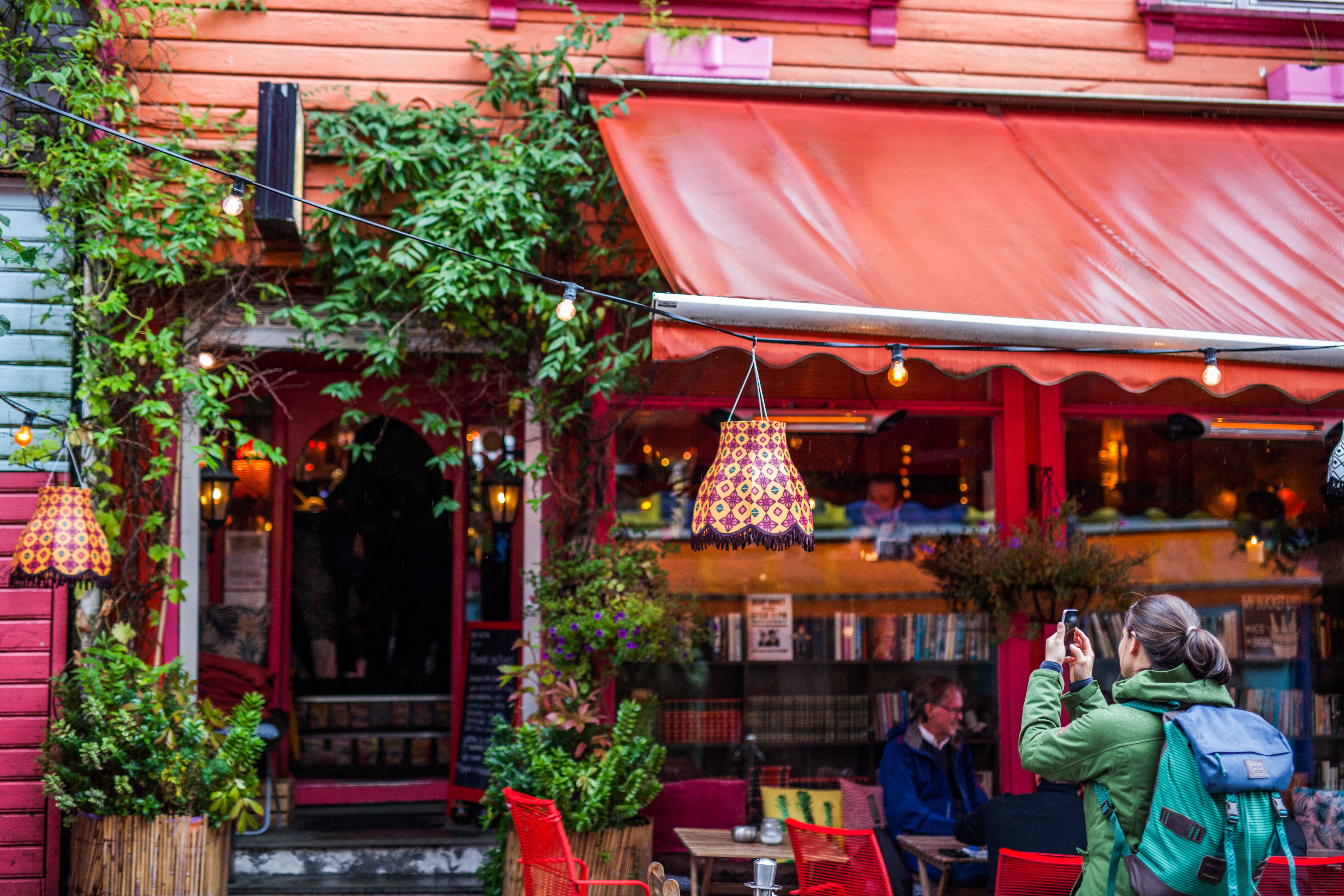 A woman taking a picture of fargegaten in Stavanger