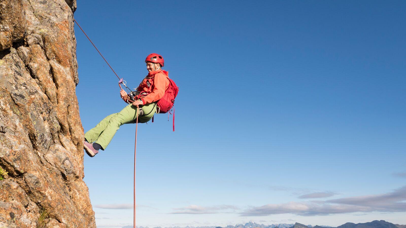 Rappelling down "Reka" in Vesterålen, Northern Norway