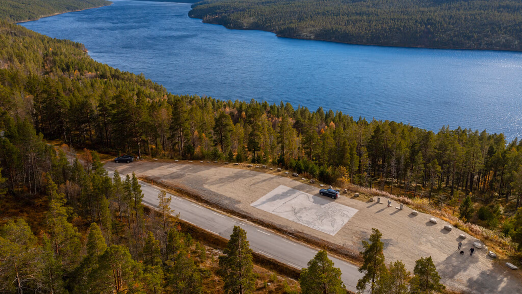 Art work on the ground in the middle of a vast nature landscape