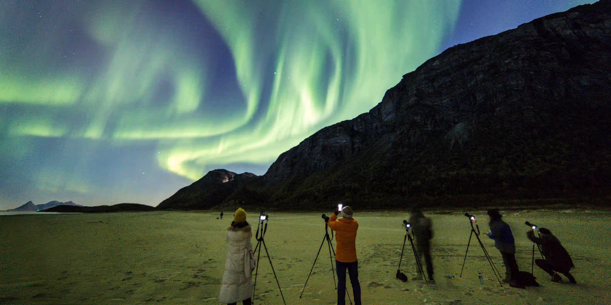 People learning how to photograph the northern lights in Gildeskål, Northern Norway