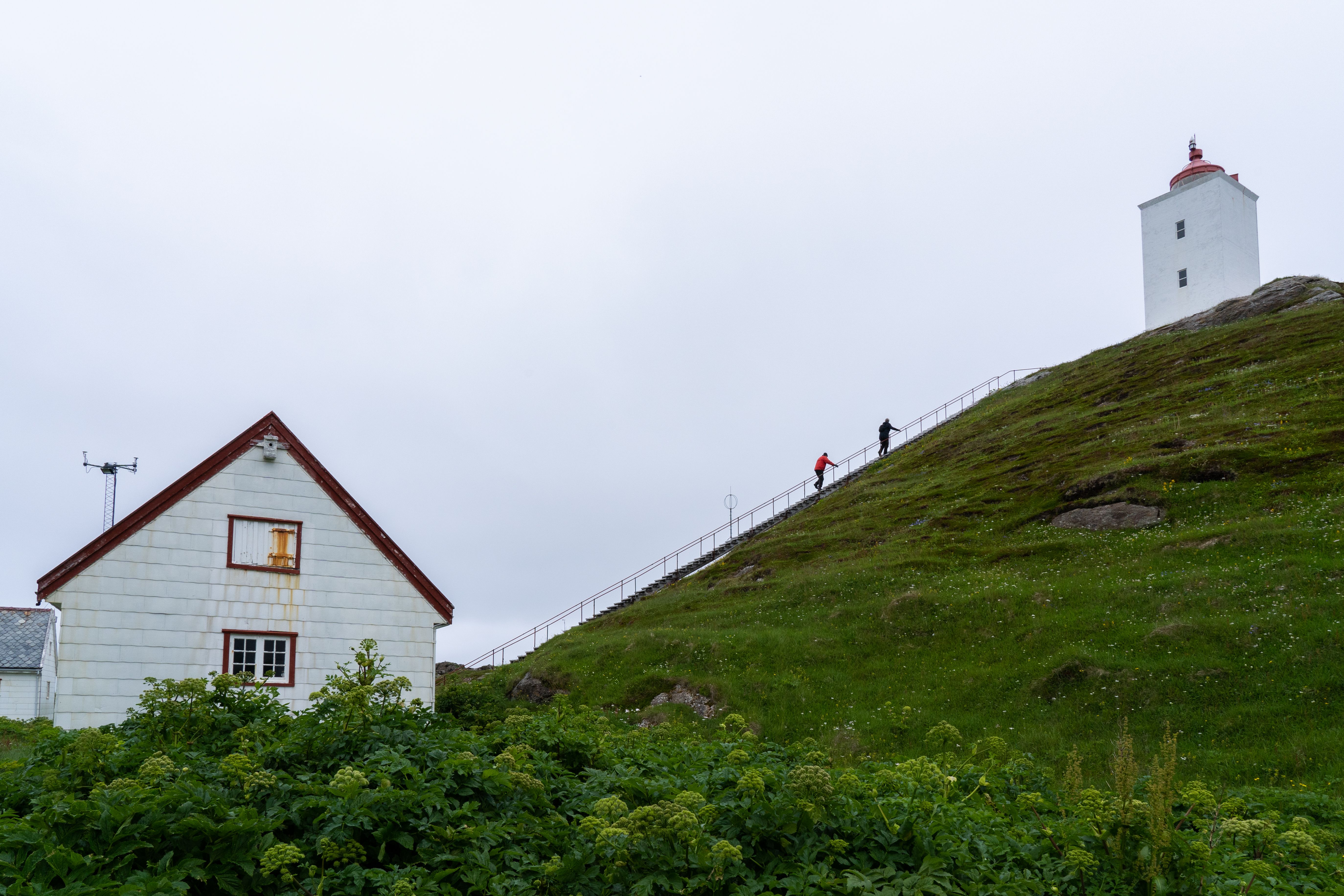 White lighthouse viewed from below