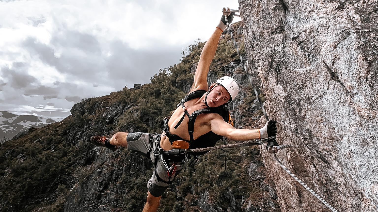 A man enjoying the via ferrata in Loen