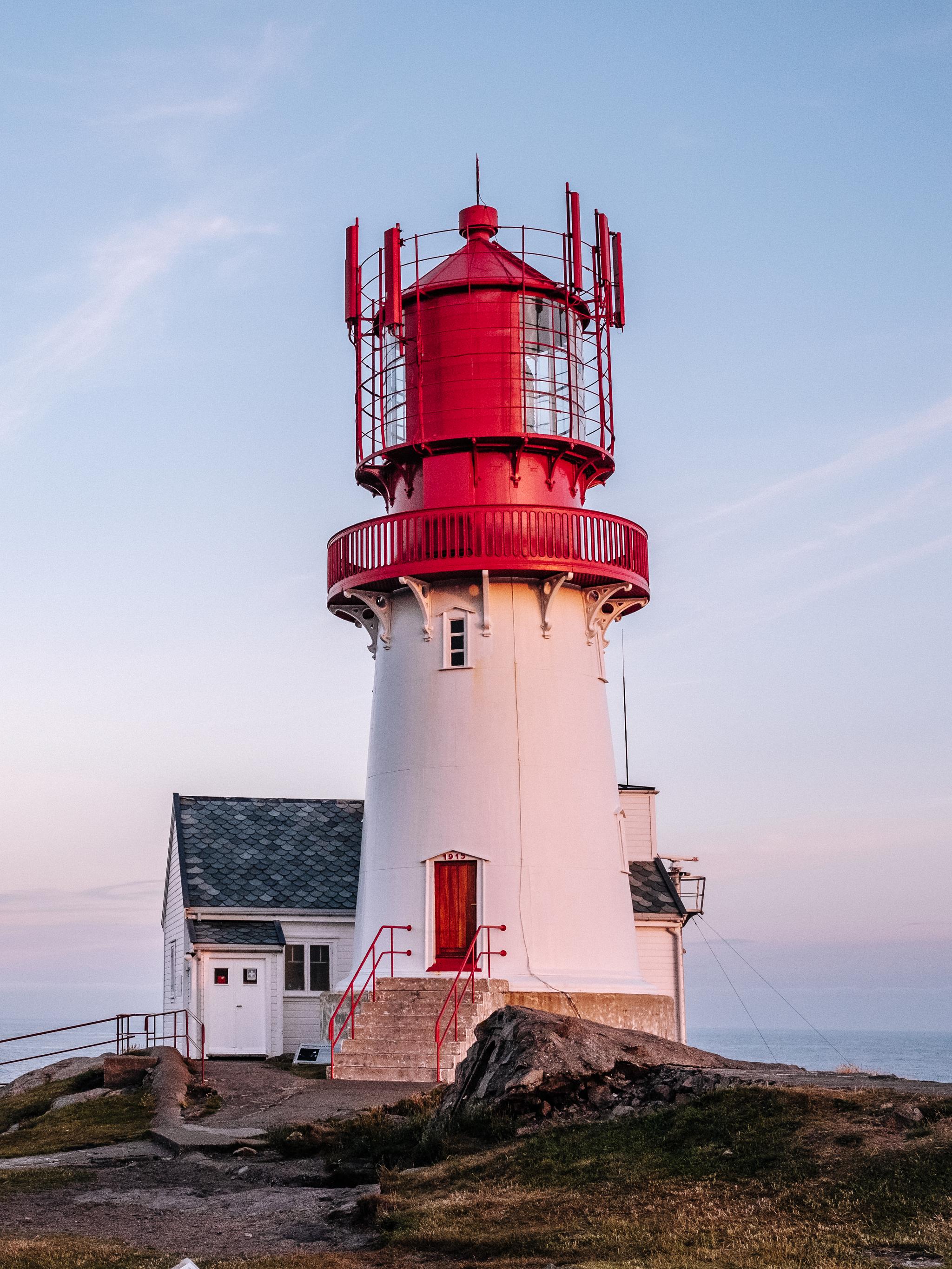 Lindesnes lighthouse in Southern Norway during sunset.