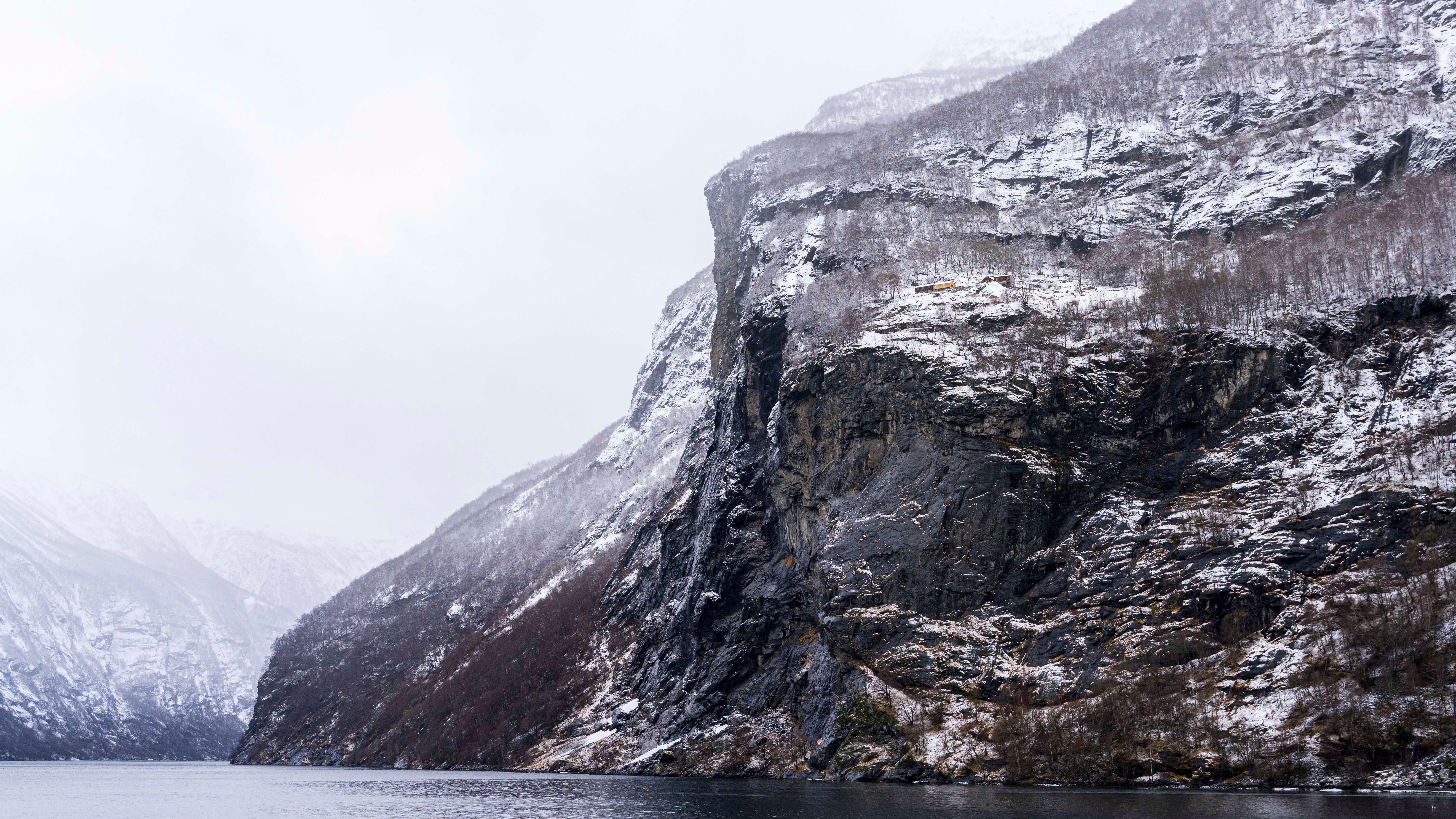 The Geirangerfjord and the Skageflå farm in winter, seen from the cruise boat