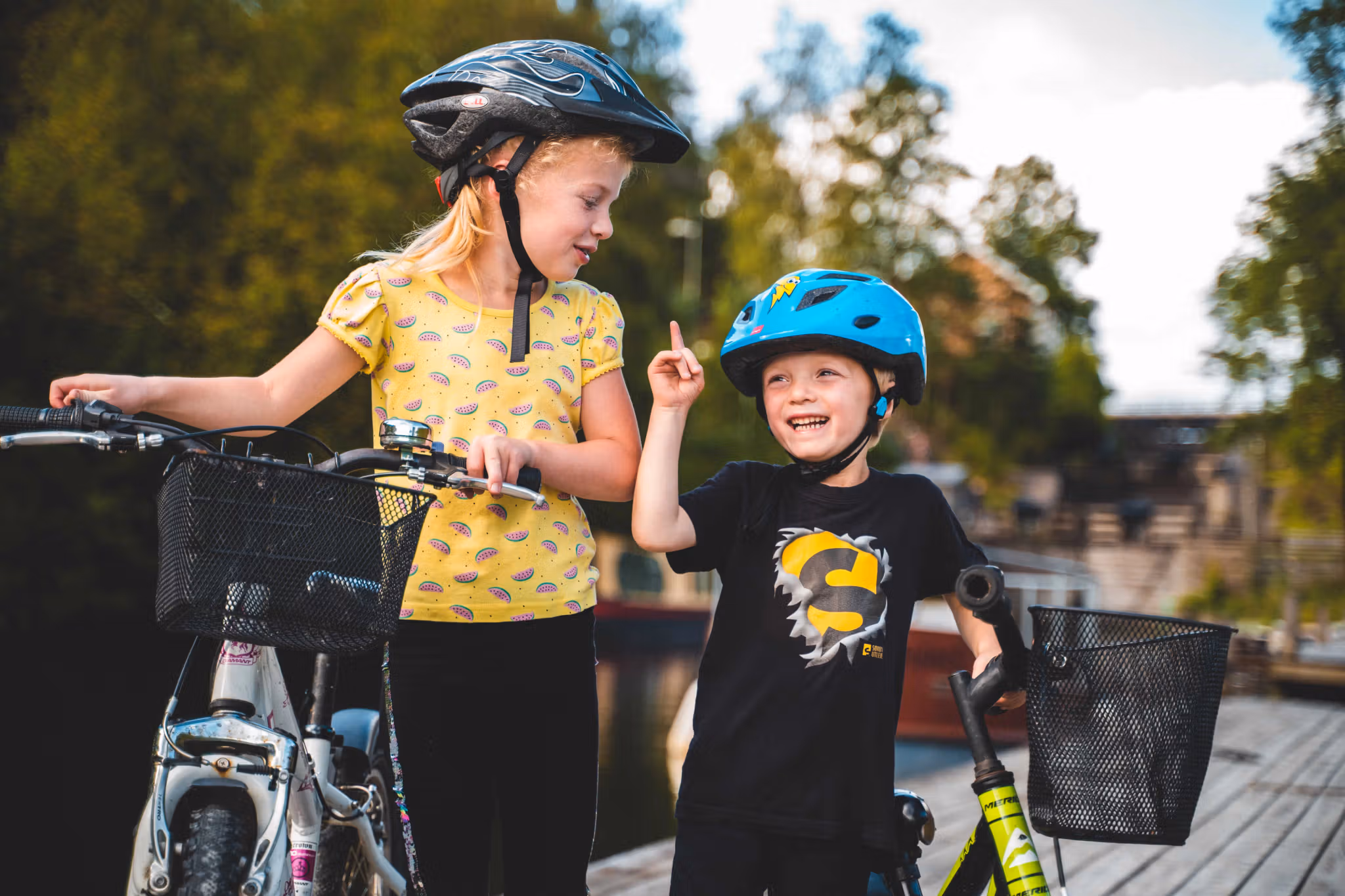 Kids biking along the Halden Canal in Eastern Norway.