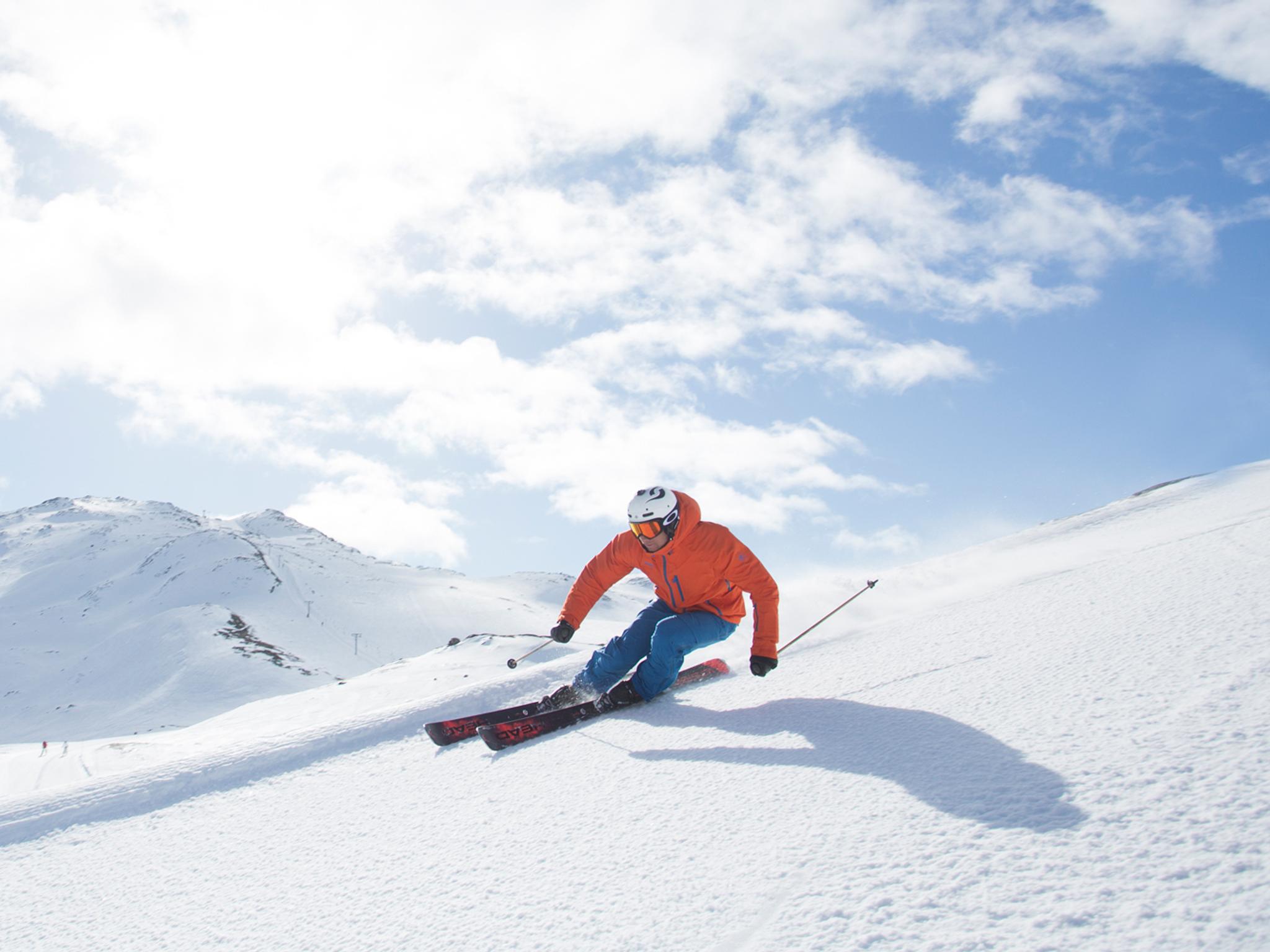 Plan your trip to Hemsedal: A person alpine skiing in Hemsedal, Eastern Norway