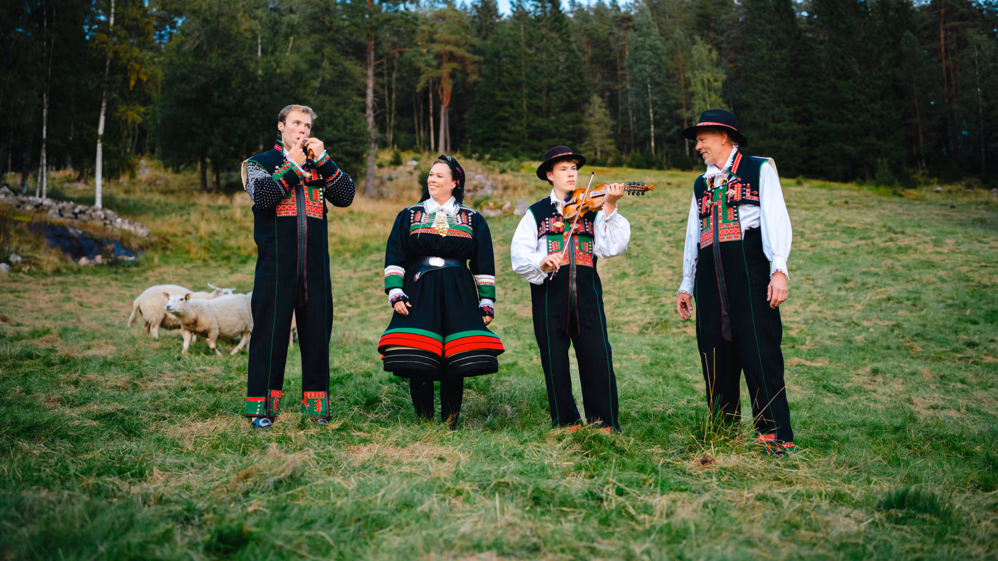 The Stulien Robstad family at the farm Syrtveit Gard, in the Setesdalen valley, Southern Norway, all dressed up in Setesdalbunad