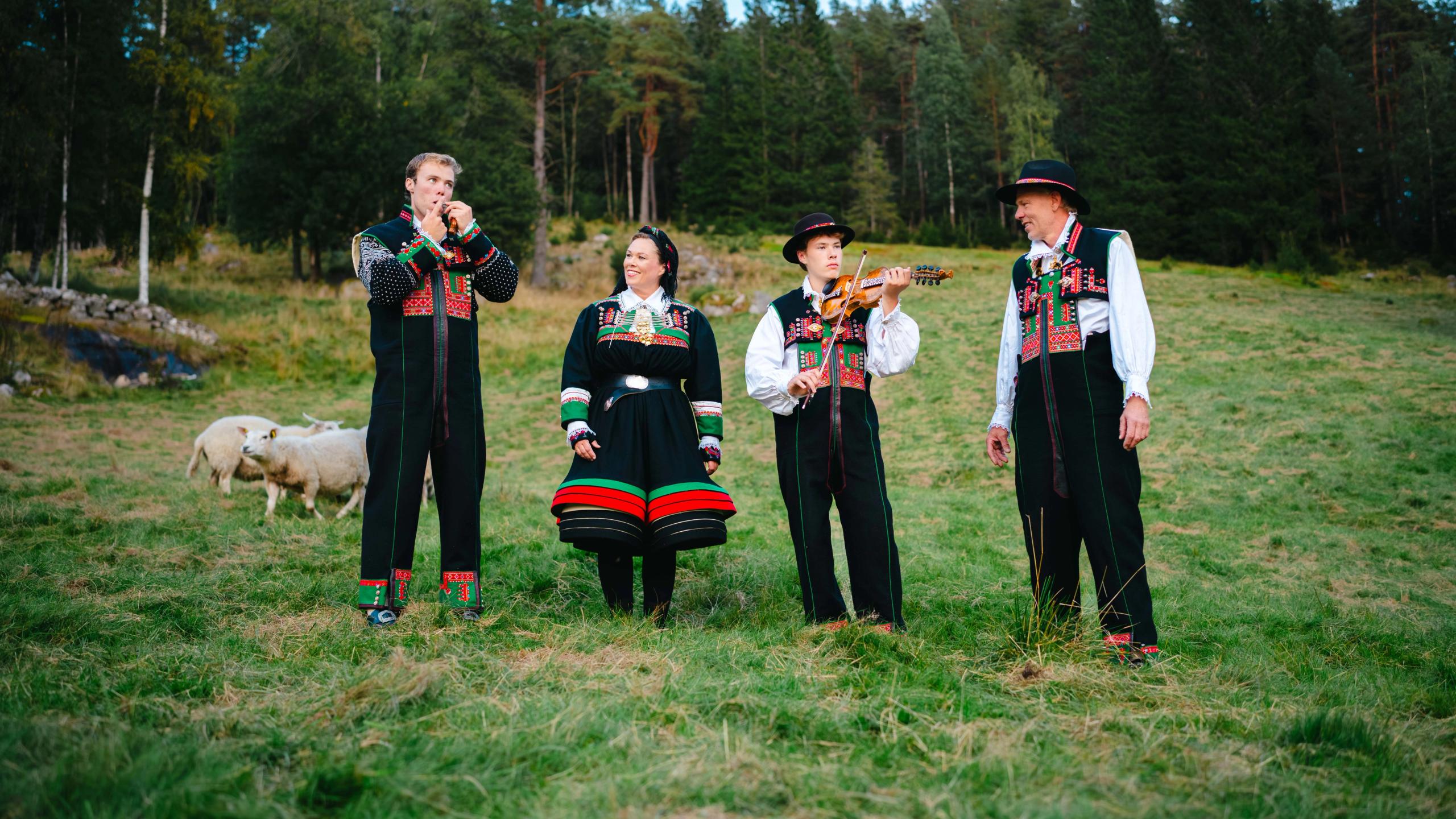 The Stulien Robstad family at the farm Syrtveit Gard, in the Setesdalen valley, Southern Norway, all dressed up in Setesdalbunad