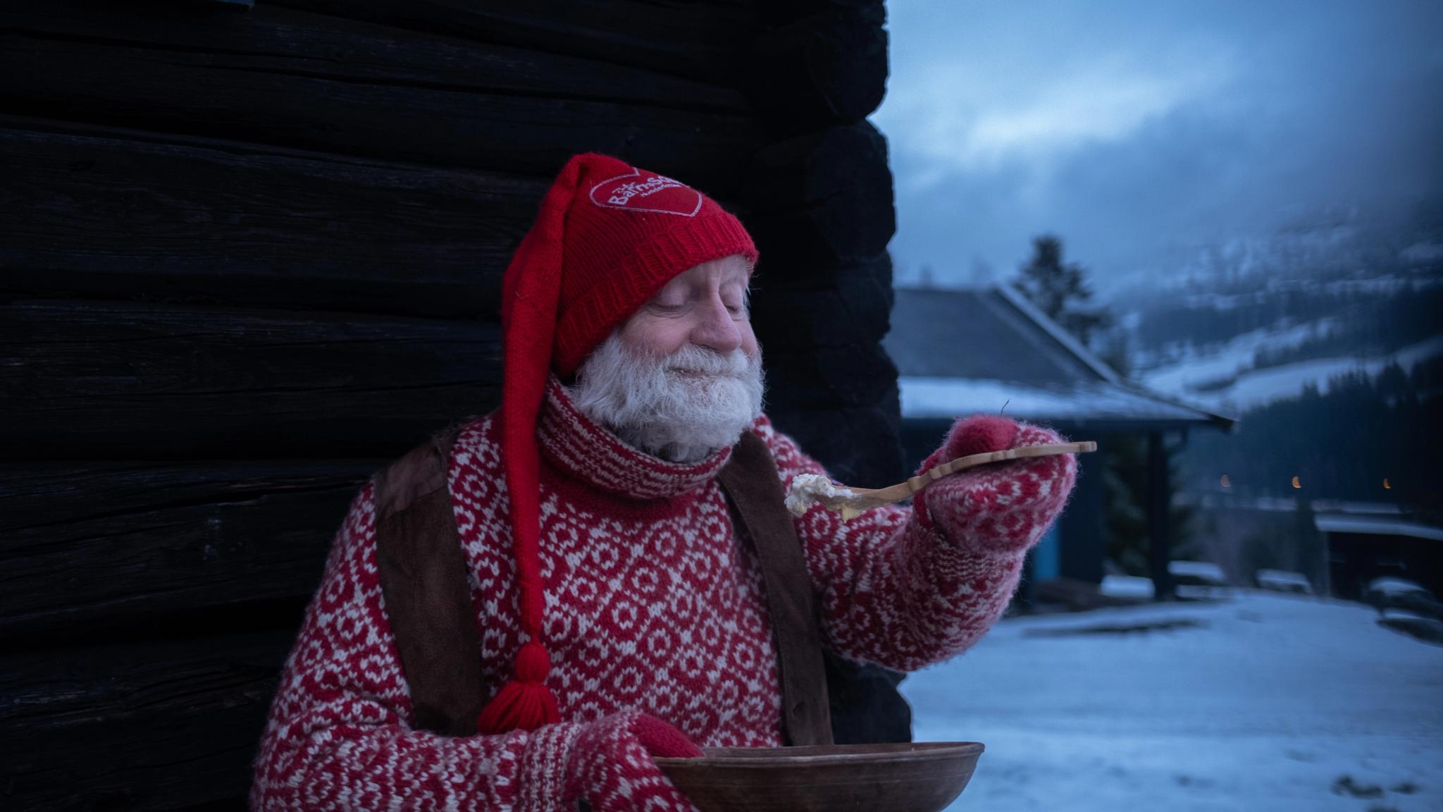 The Norwegian "Fjøsnisse" eating porridge.