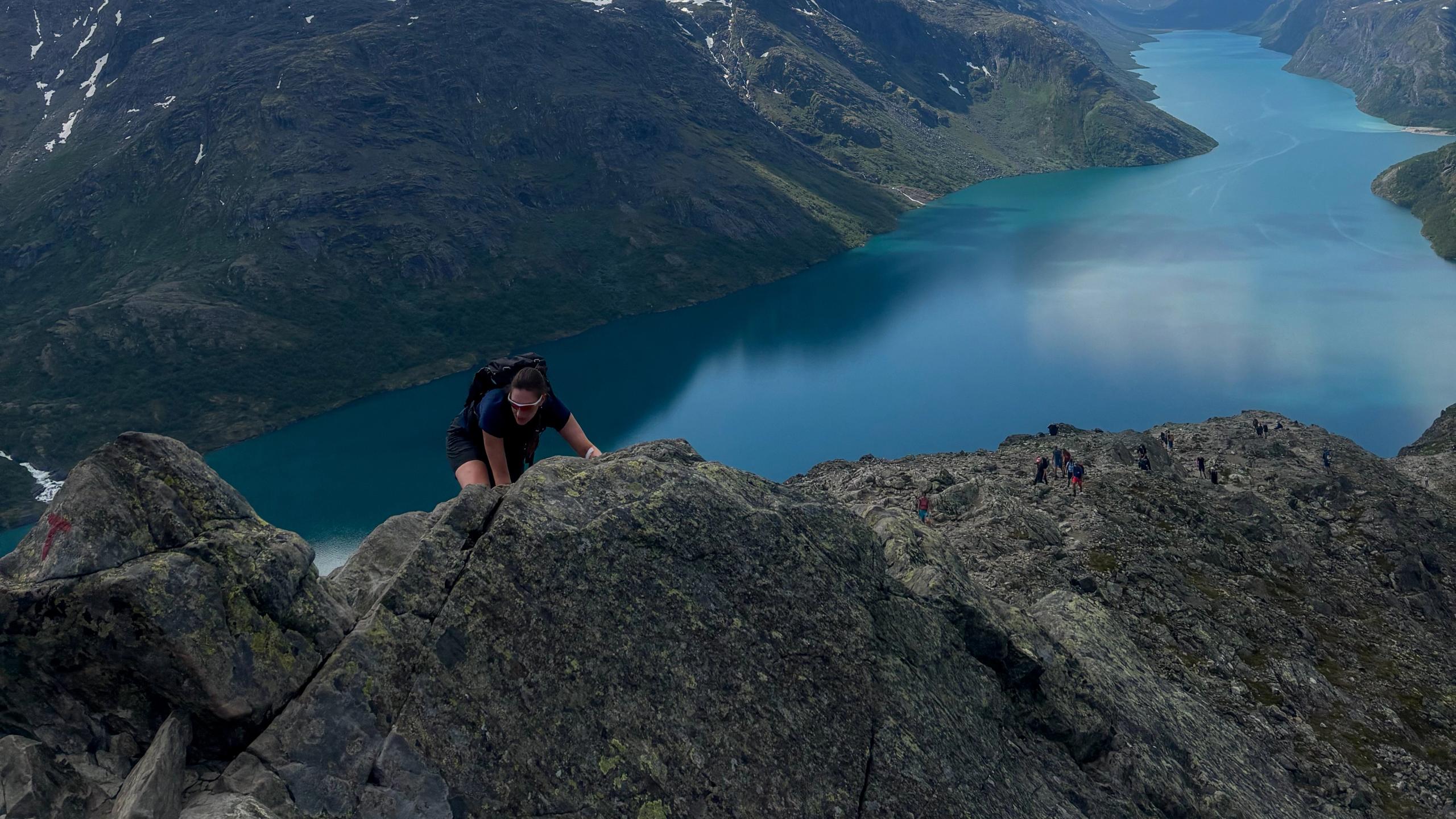 A woman hiking the Besseggen ridge in the Jotunheimen mountains.
