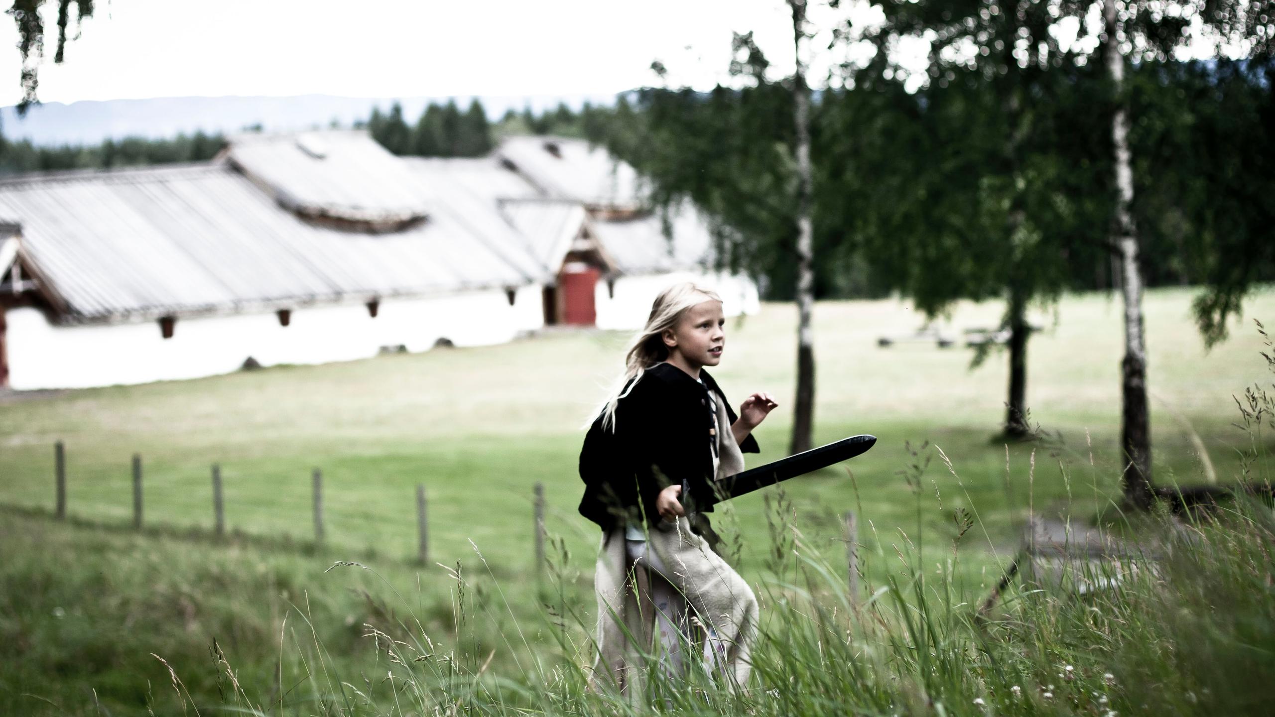 A girl playing in Veien Kulturminnepark in Ringerike, Eastern Norway
