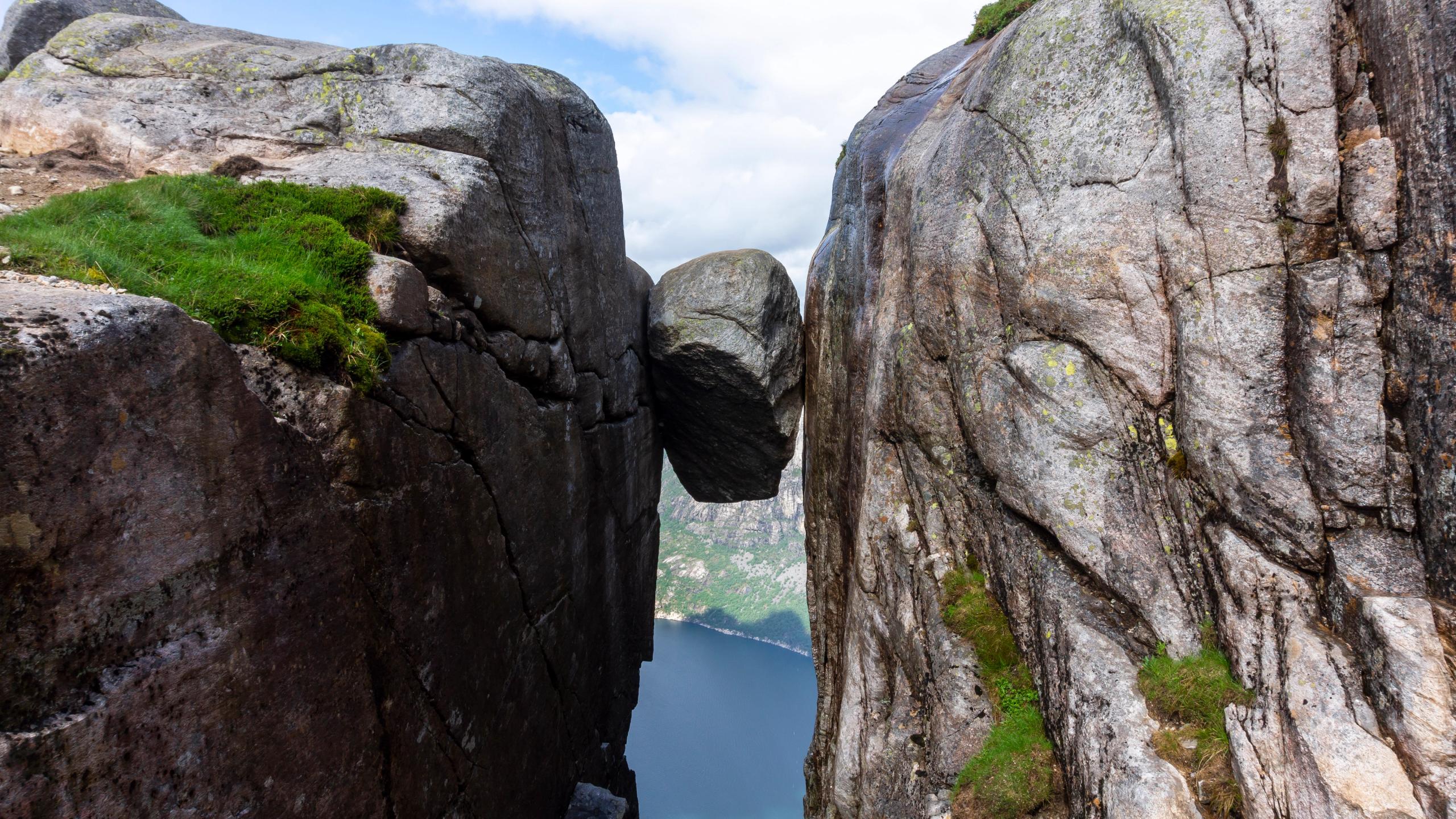 The Kjeragbolten boulder wedged in a mountain crevasse above the Lysefjord in Norway
