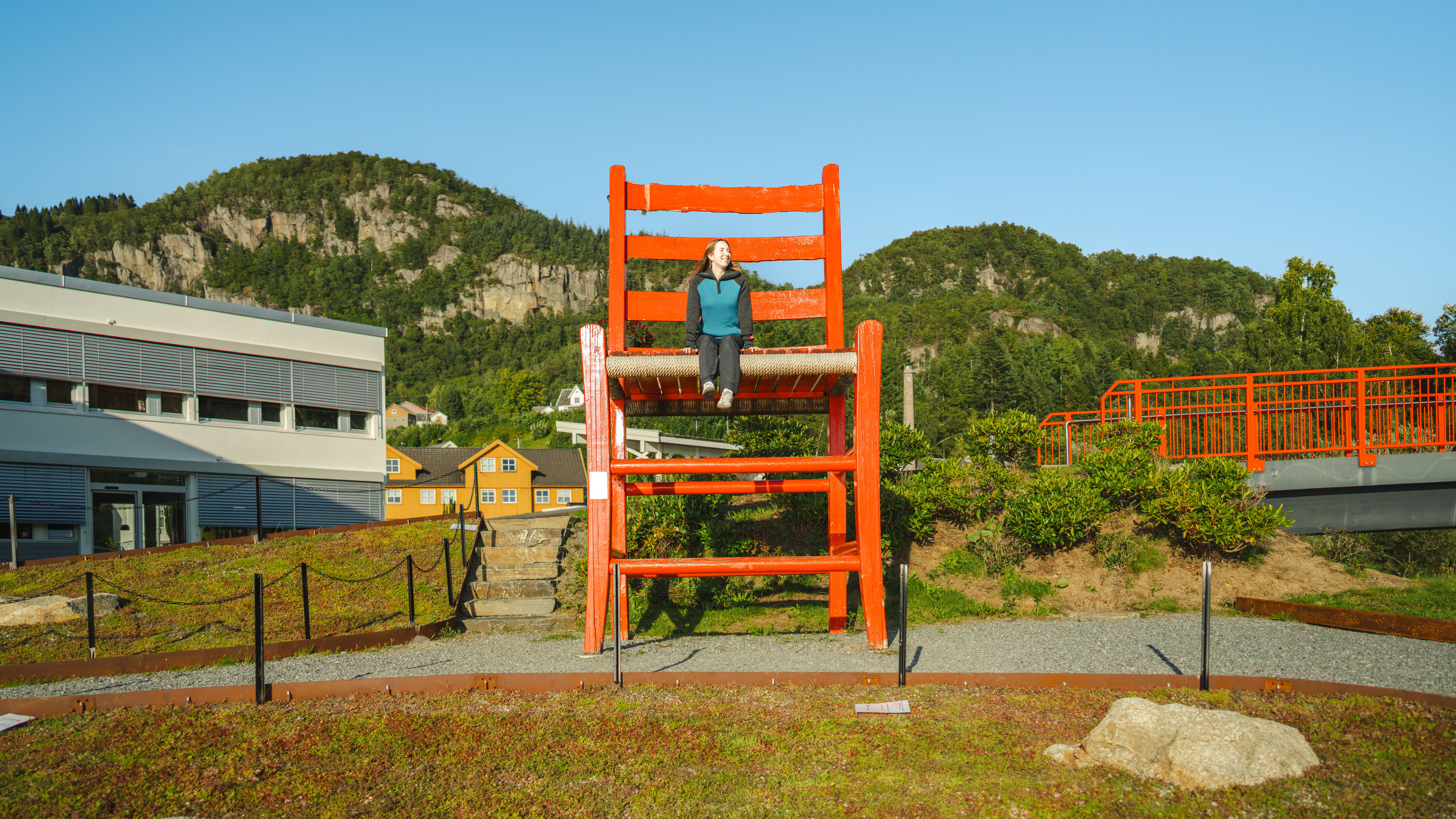 A huge traditional wooden chair.
