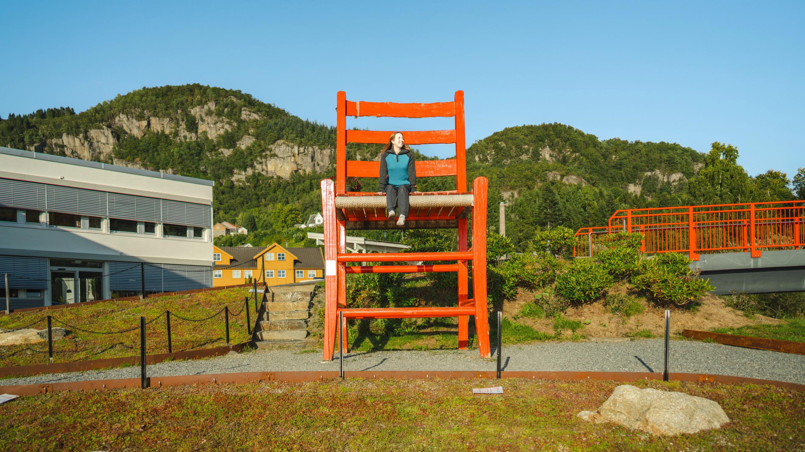 A huge traditional wooden chair.