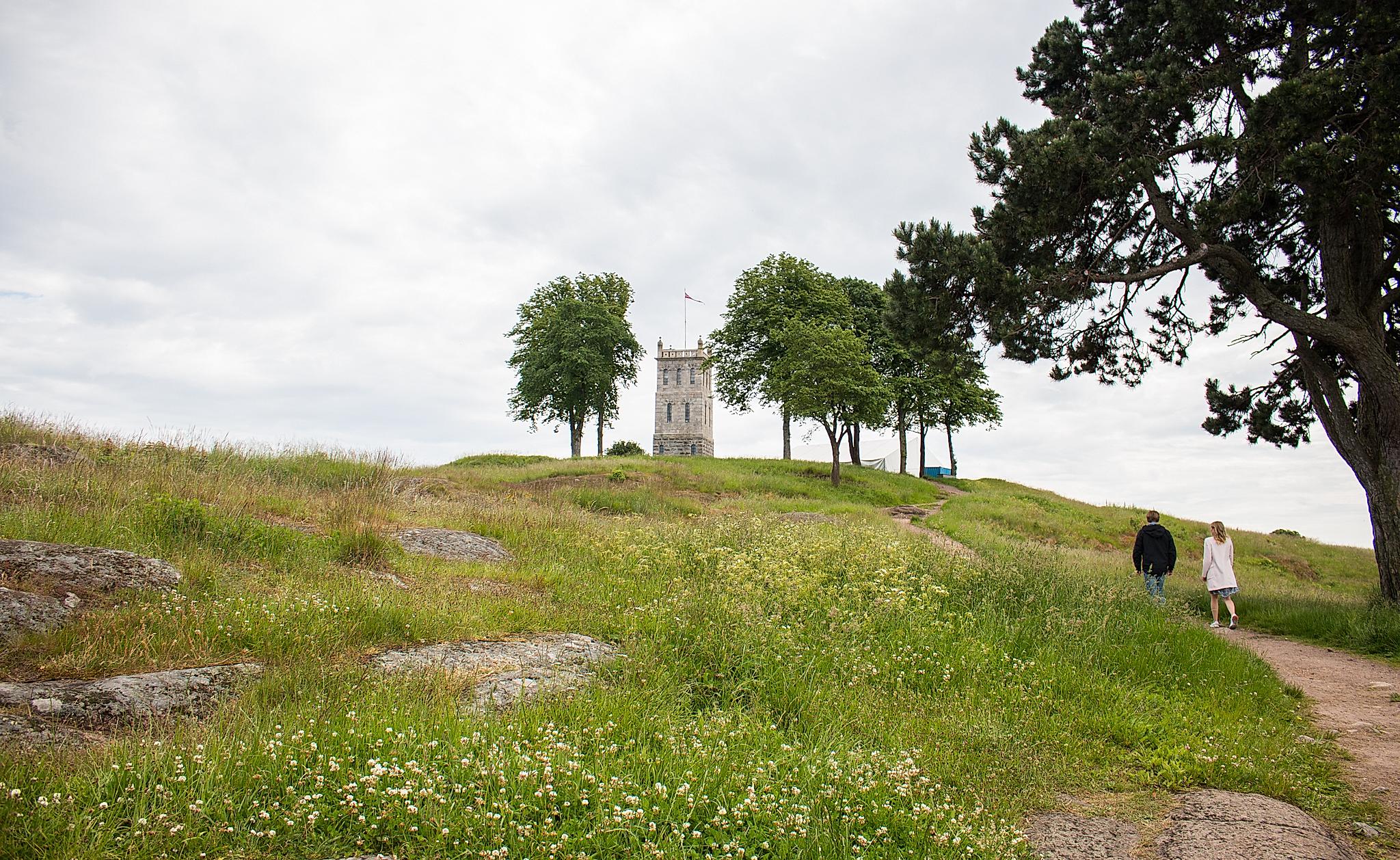 A couple visiting the Slottsfjell tower in Tønsberg, Eastern Norway