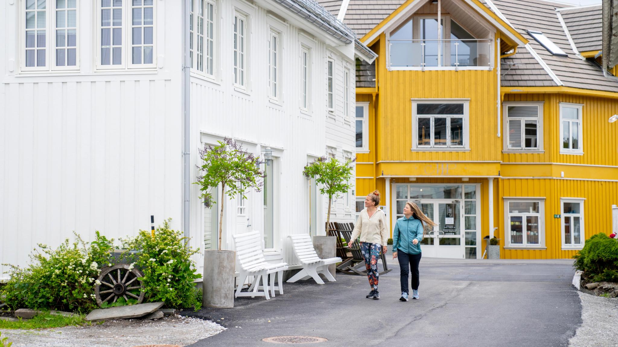 Two woman walking in Straumen, the center of Inderøy