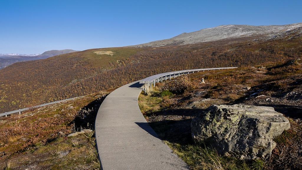 Walk path through barren mountains