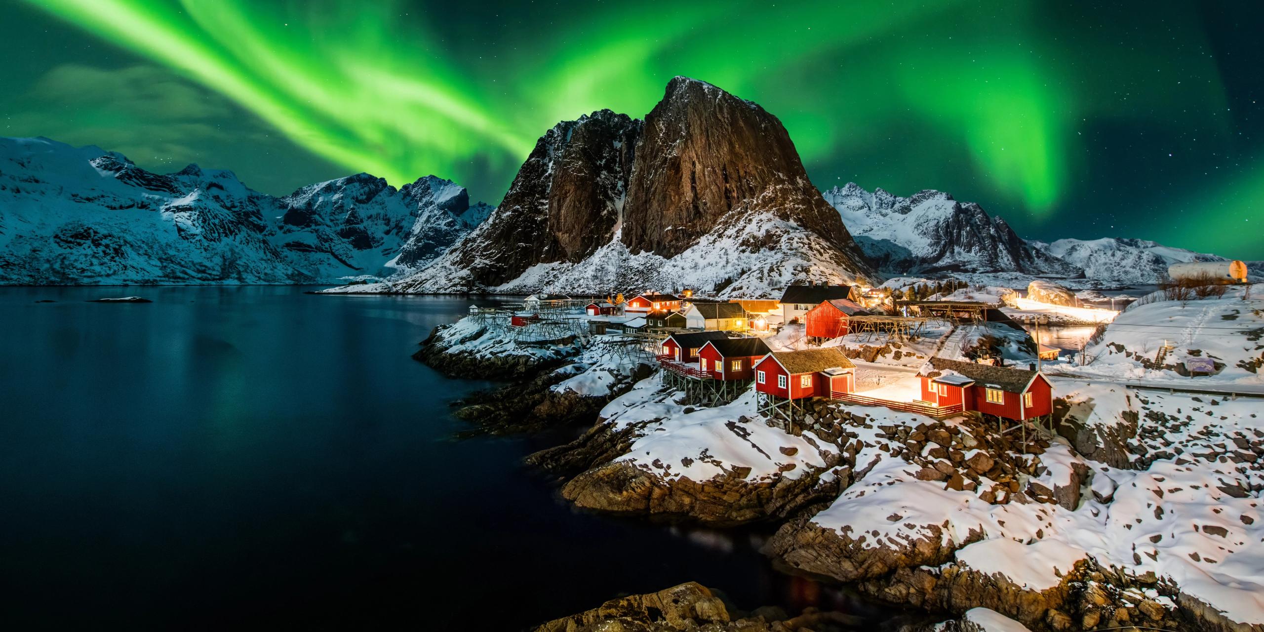 A view of Lofoten underneath the Northern Lights.
