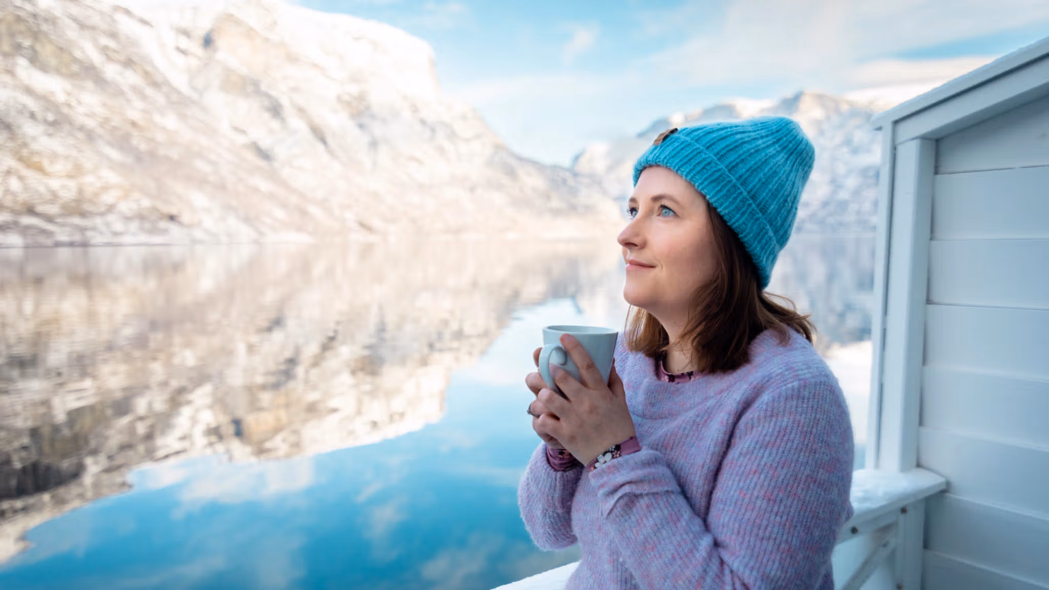 Woman by the fjord in Vangsgaarden Guesthouse in Aurland in Sognefjord