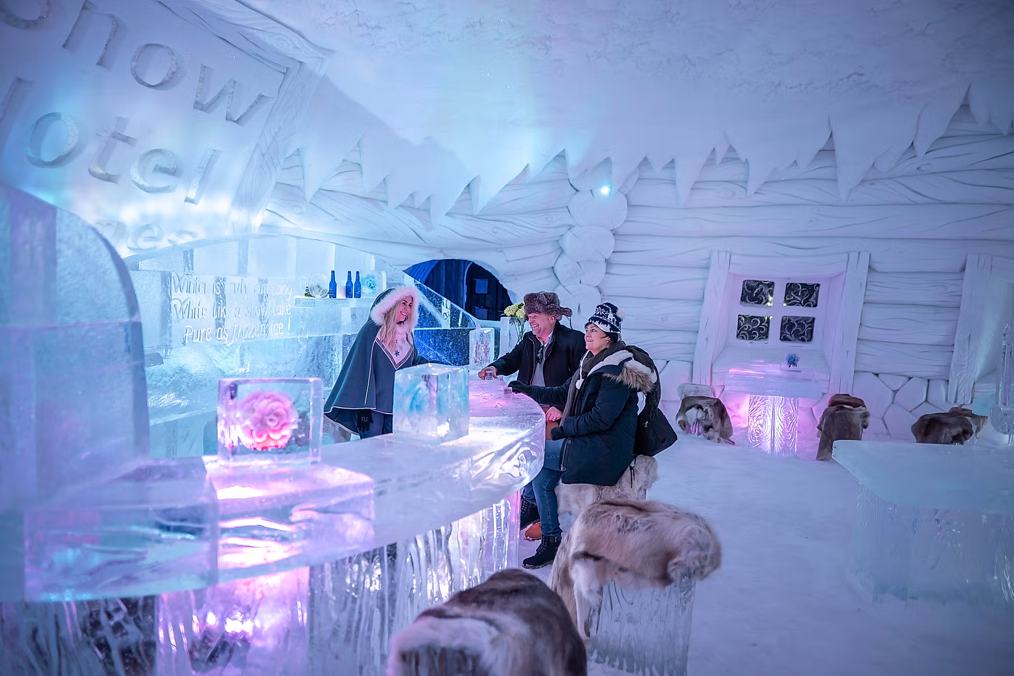 Guests in the ice bar at Snowhotel Kirkenes
