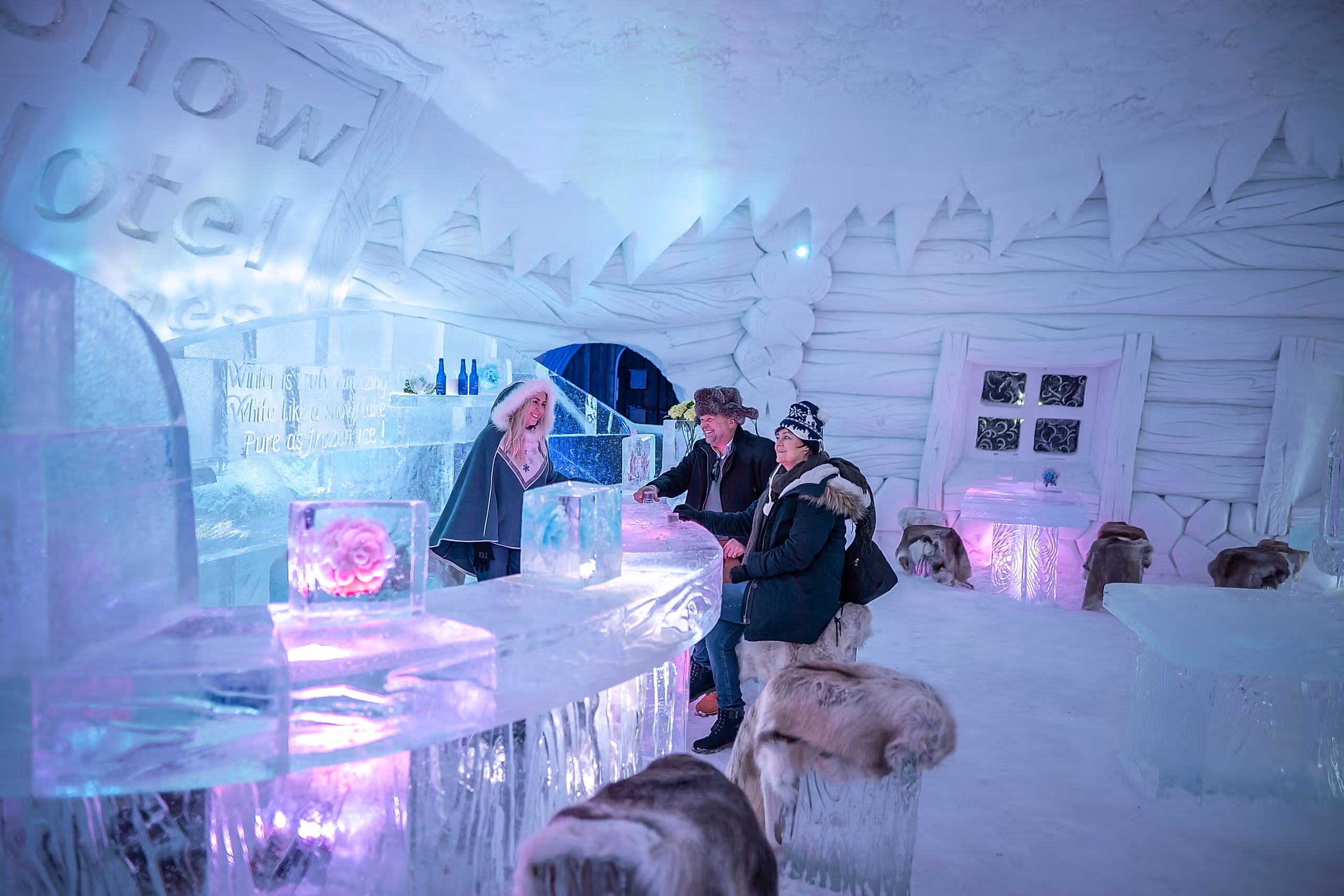Guests in the ice bar at Snowhotel Kirkenes
