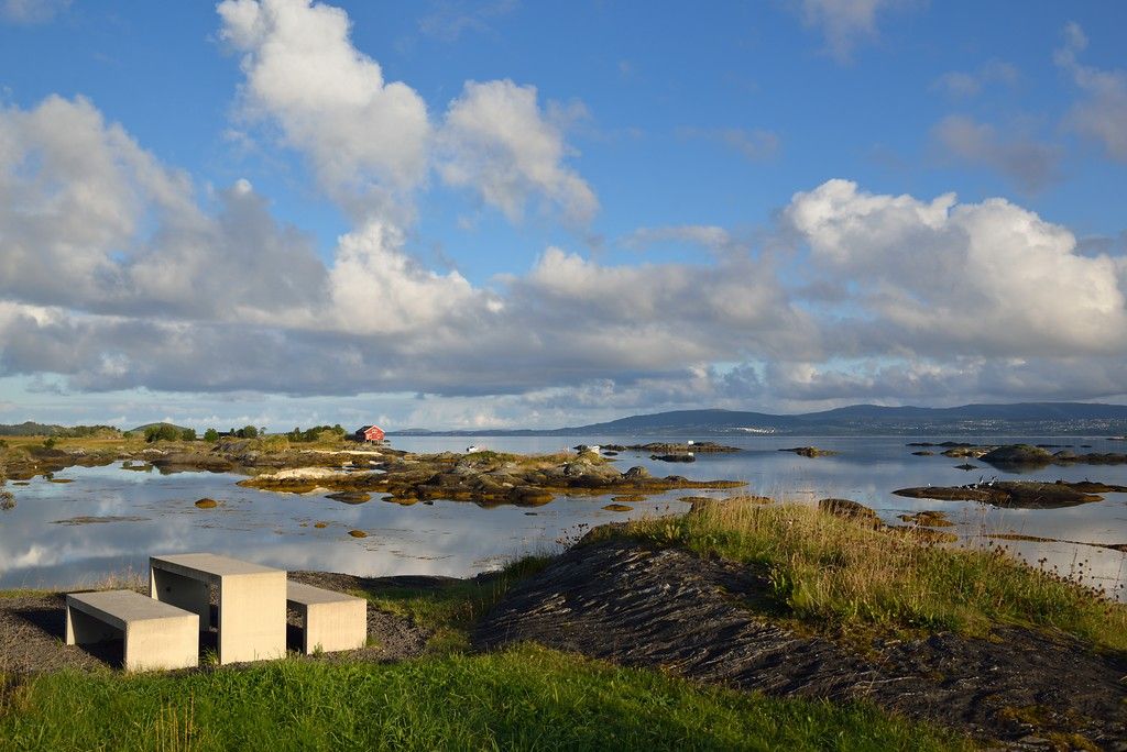 A bench by the sea.