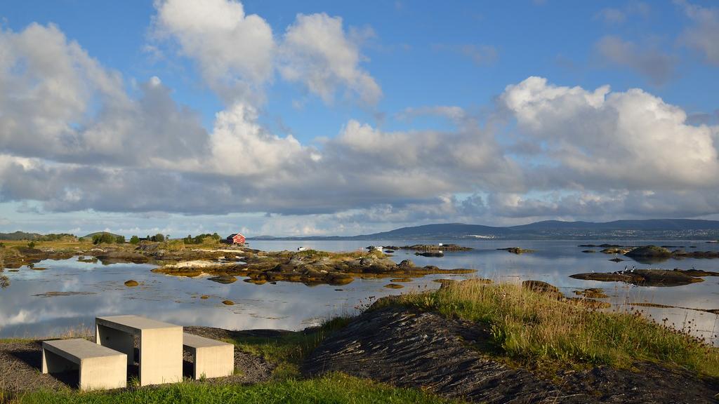 A bench by the sea.