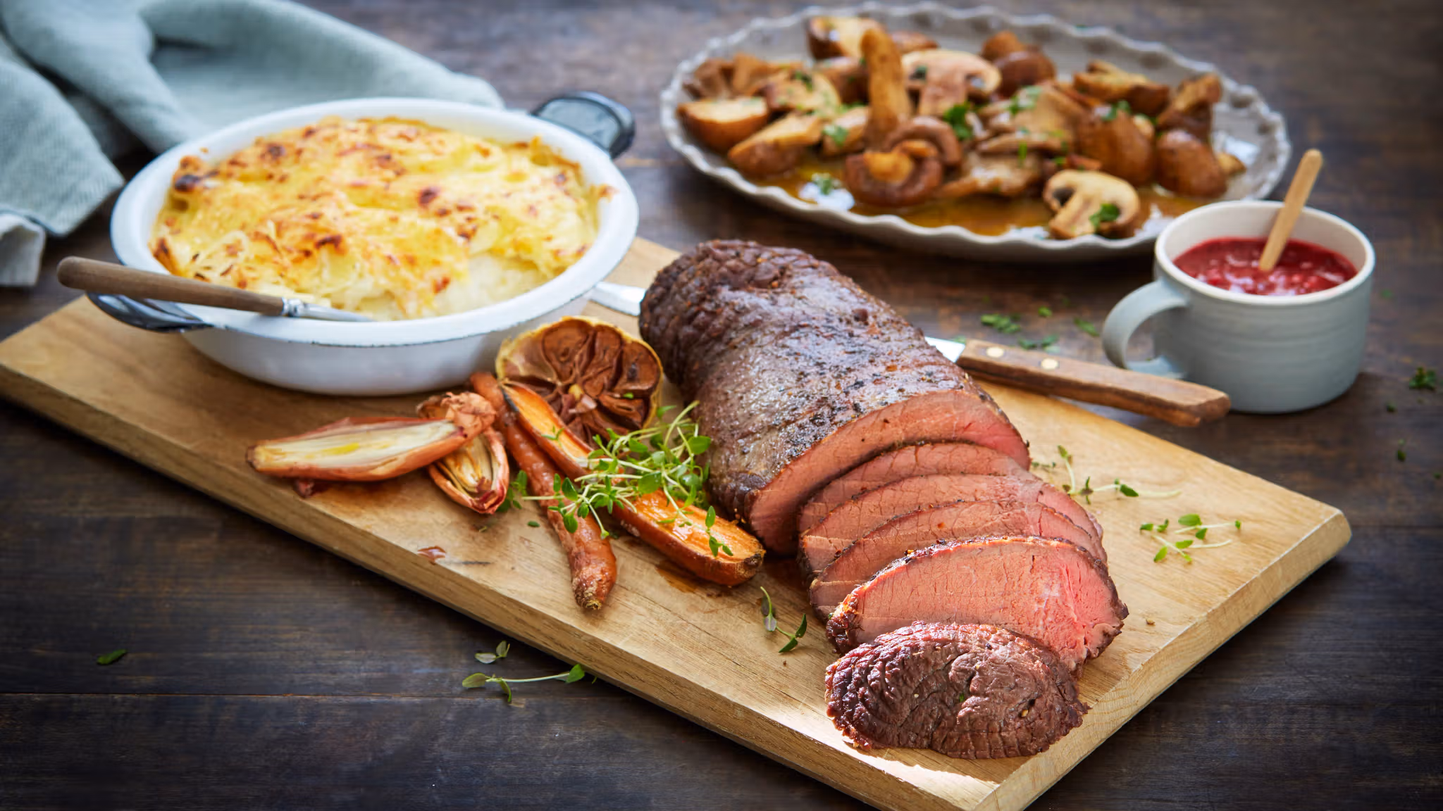 Traditional Norwegian venison steak, with potatoes, mushrooms, lingonberry jam