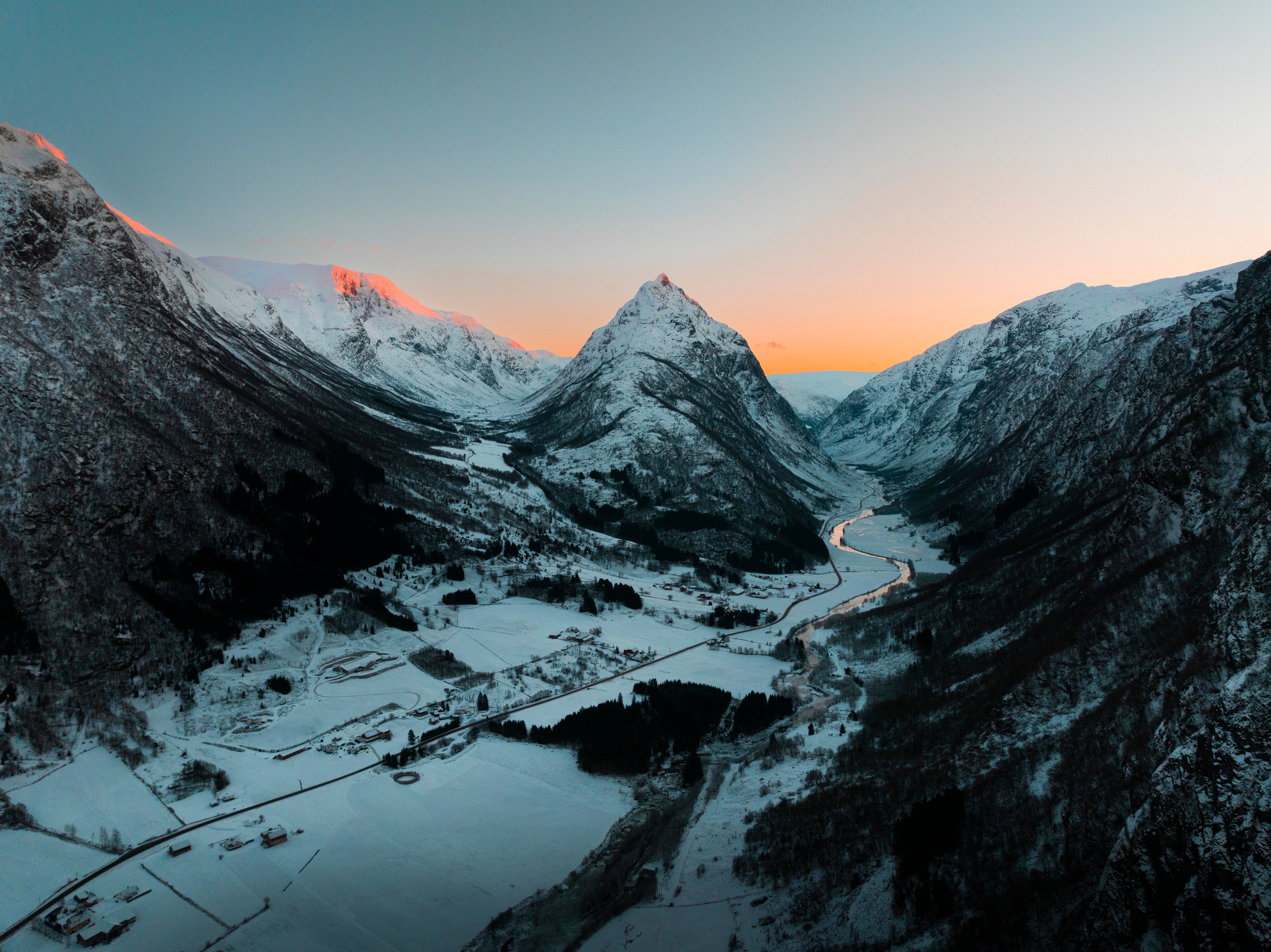 Mountains, a village and a winter sunset.