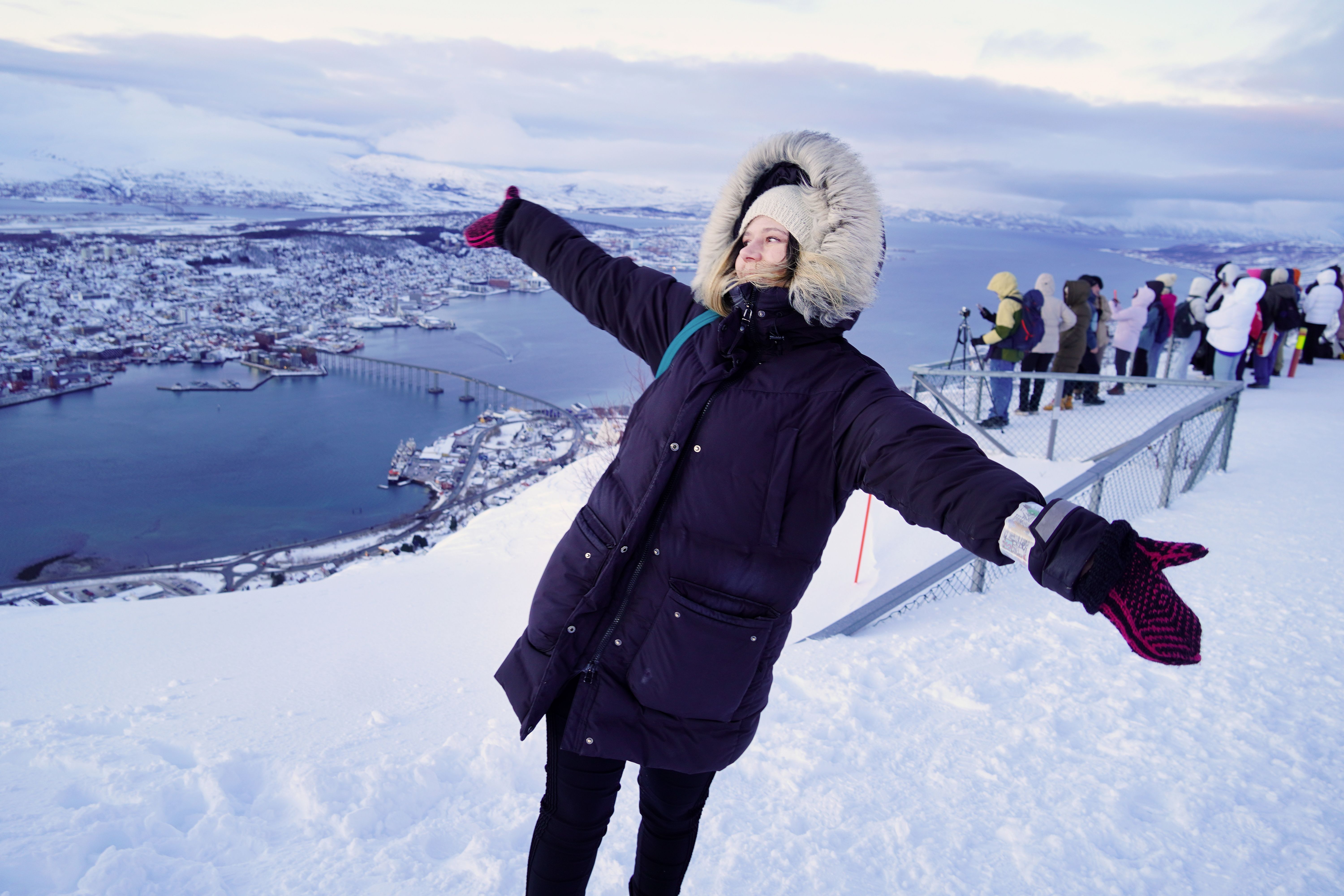 A woman dressed in winter clothes.