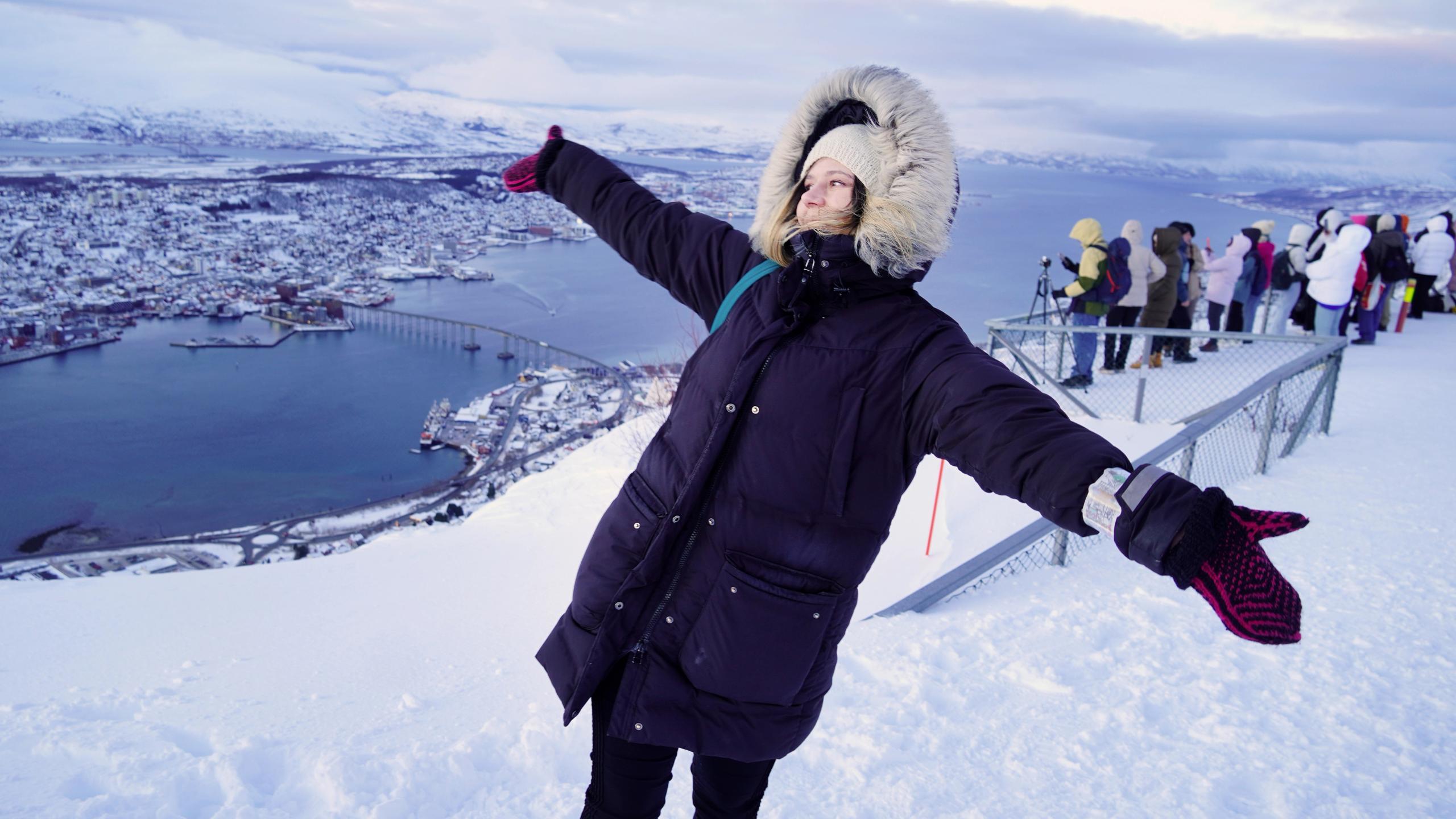 A woman dressed in winter clothes.
