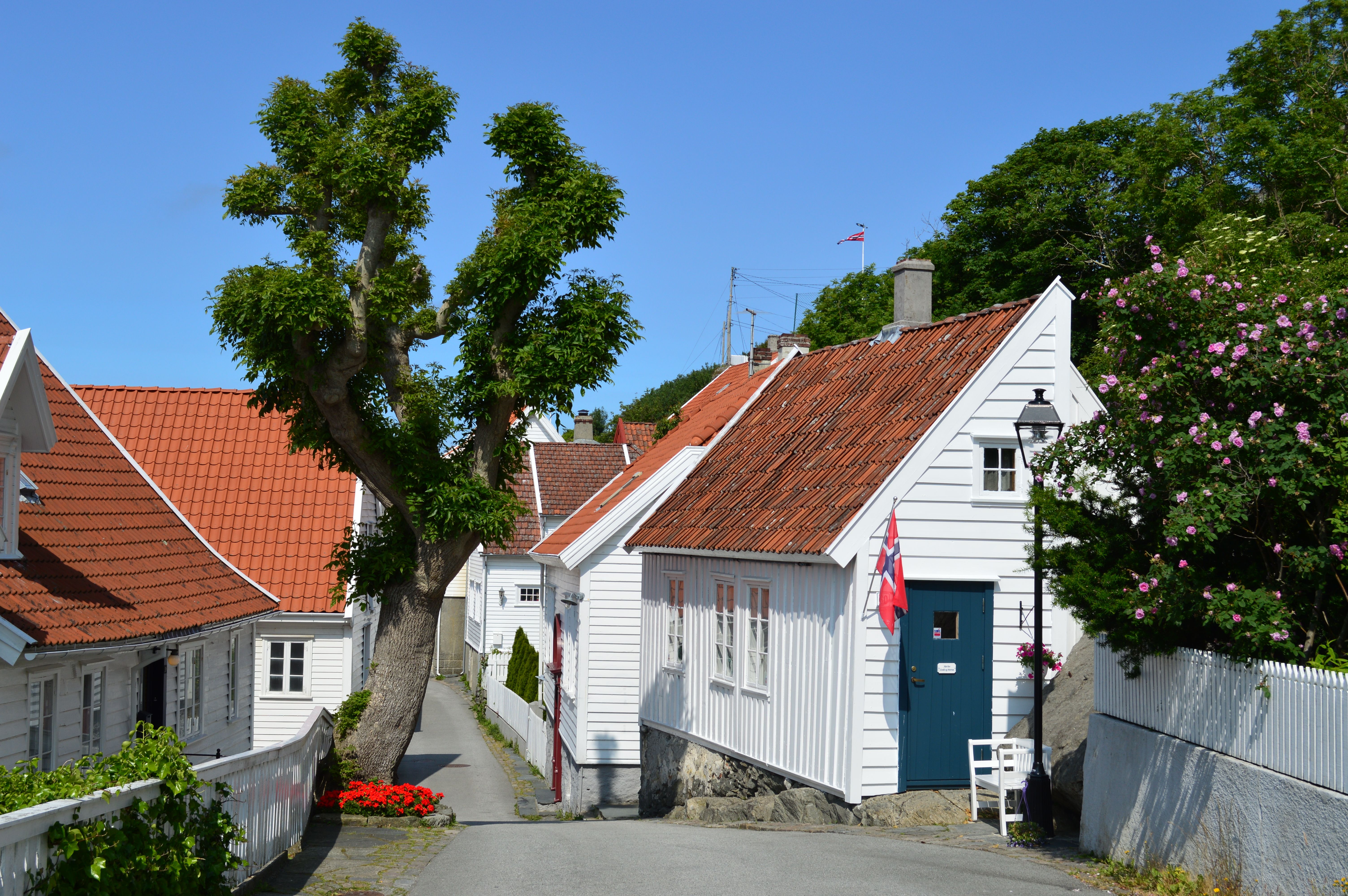 Charming wooden houses in Skudeneshavn outside of Haugesund in Fjord Norway, a coastal gem in southern Norway