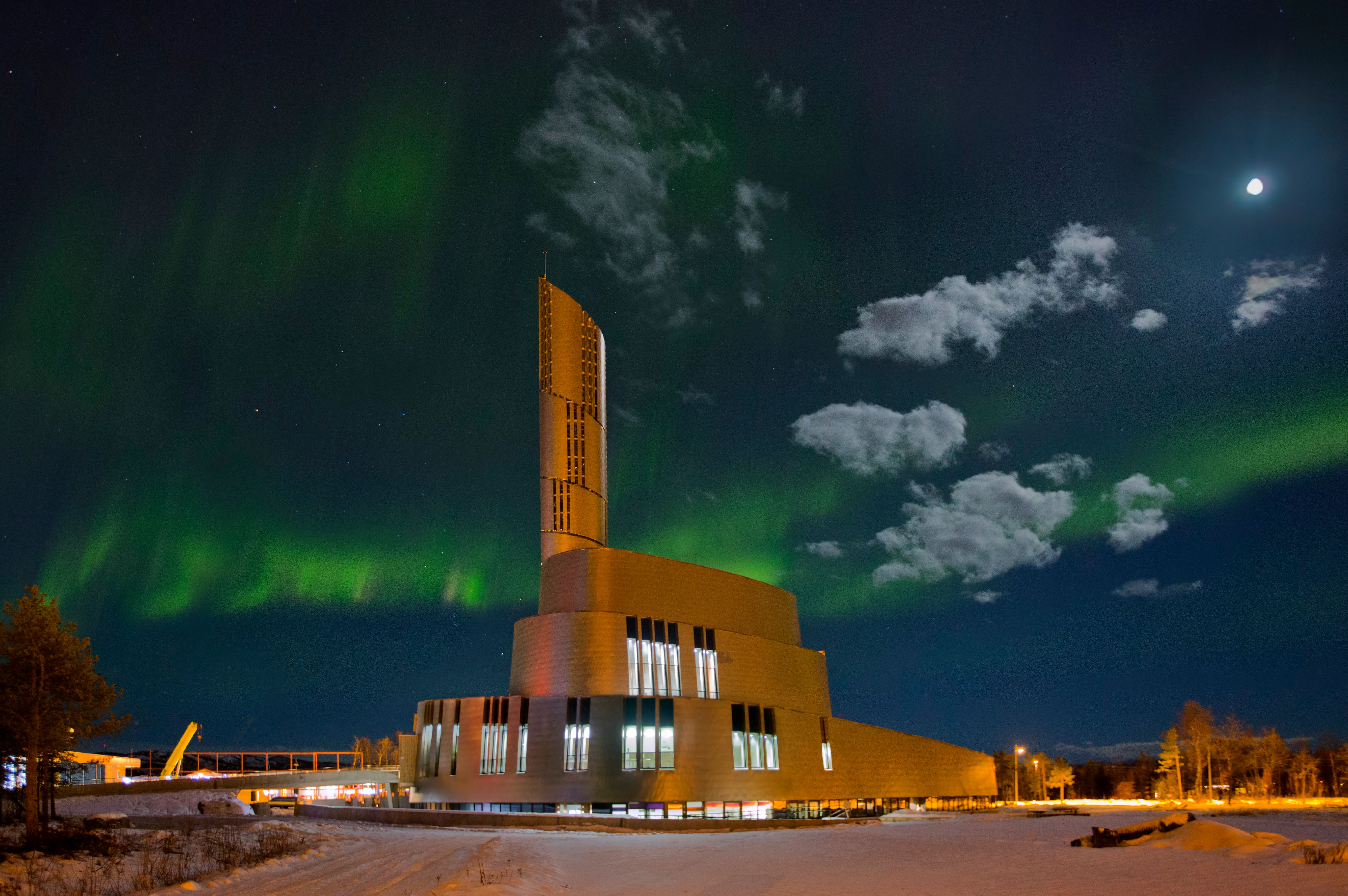 Nordlyskatedralen Cathedral in Alta surrounded by northern lights
