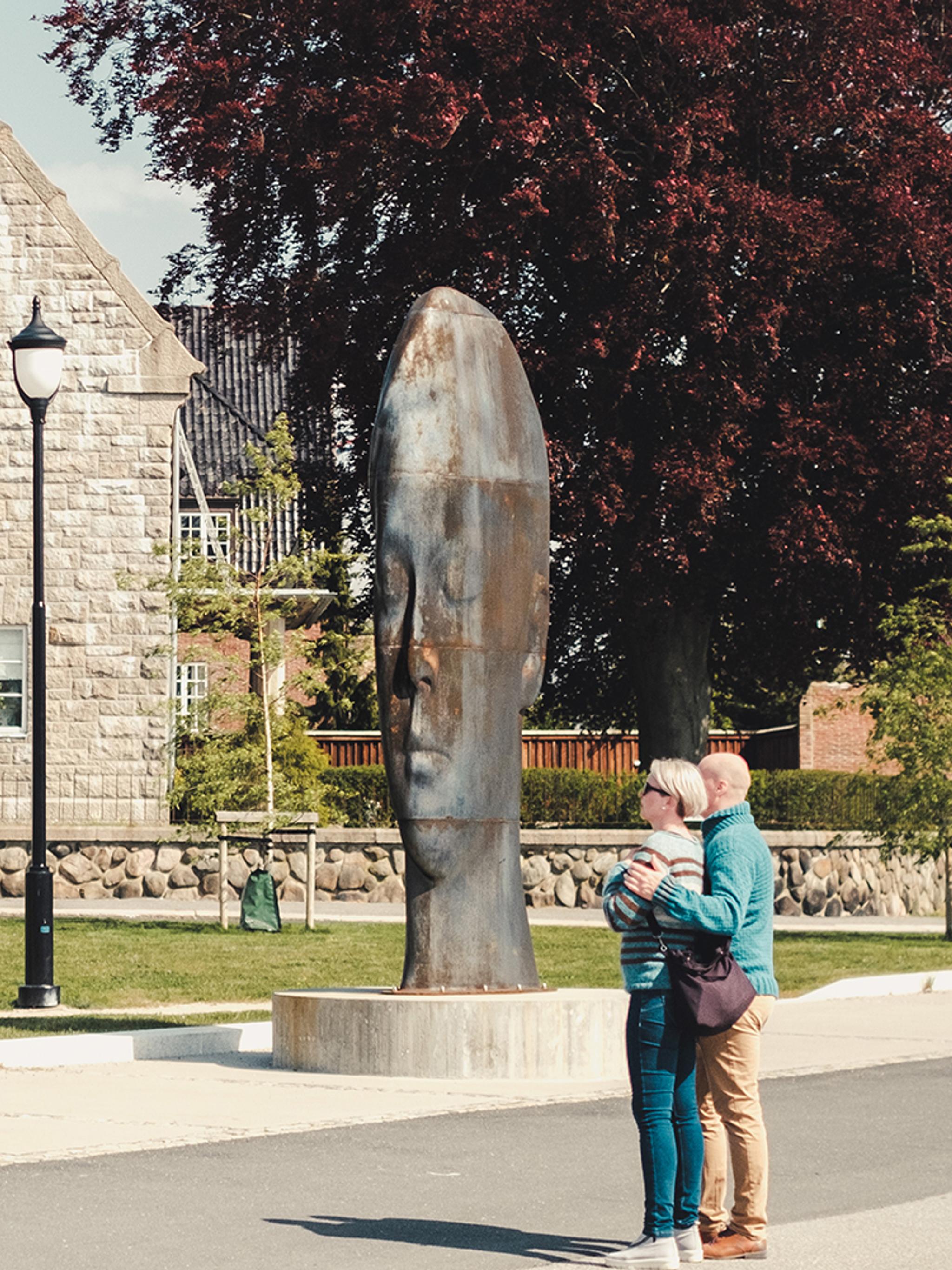 Couple looking at sculptures in Fredrikstad, Eastern Norway
