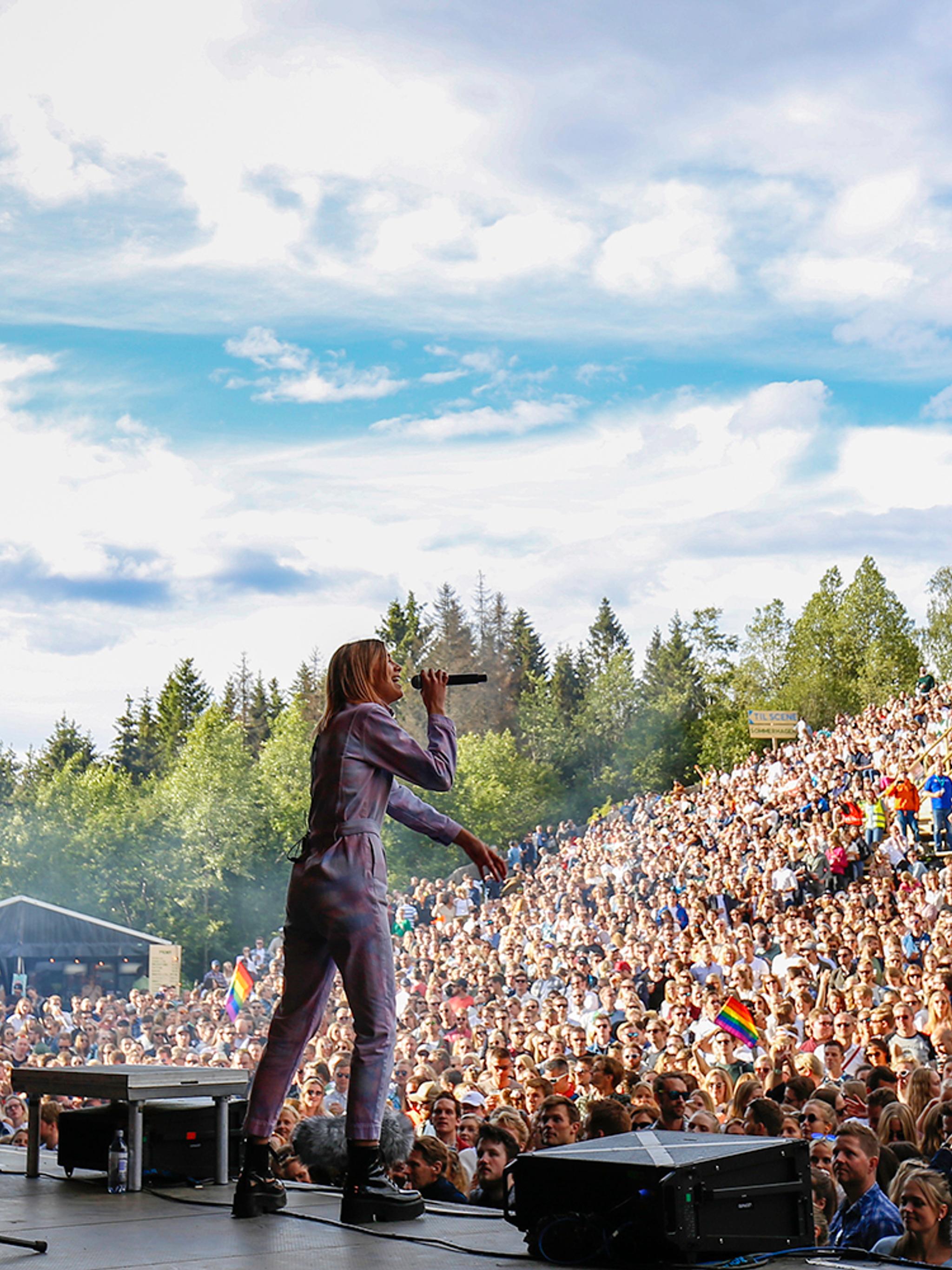 Musican performing in front of a large crowd at OsloOslo music festival at Grefsenkollen in Oslo, Eastern Norway