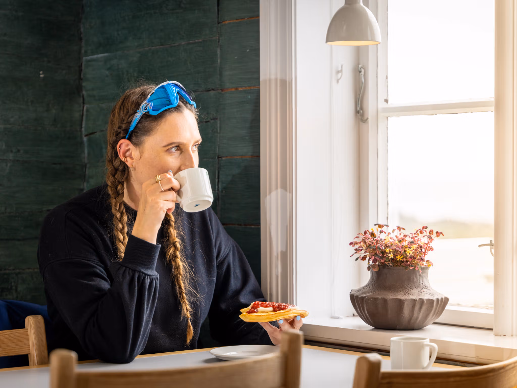 A women eats lapper at Hå old vicarage in Jæren, Fjord Norway.