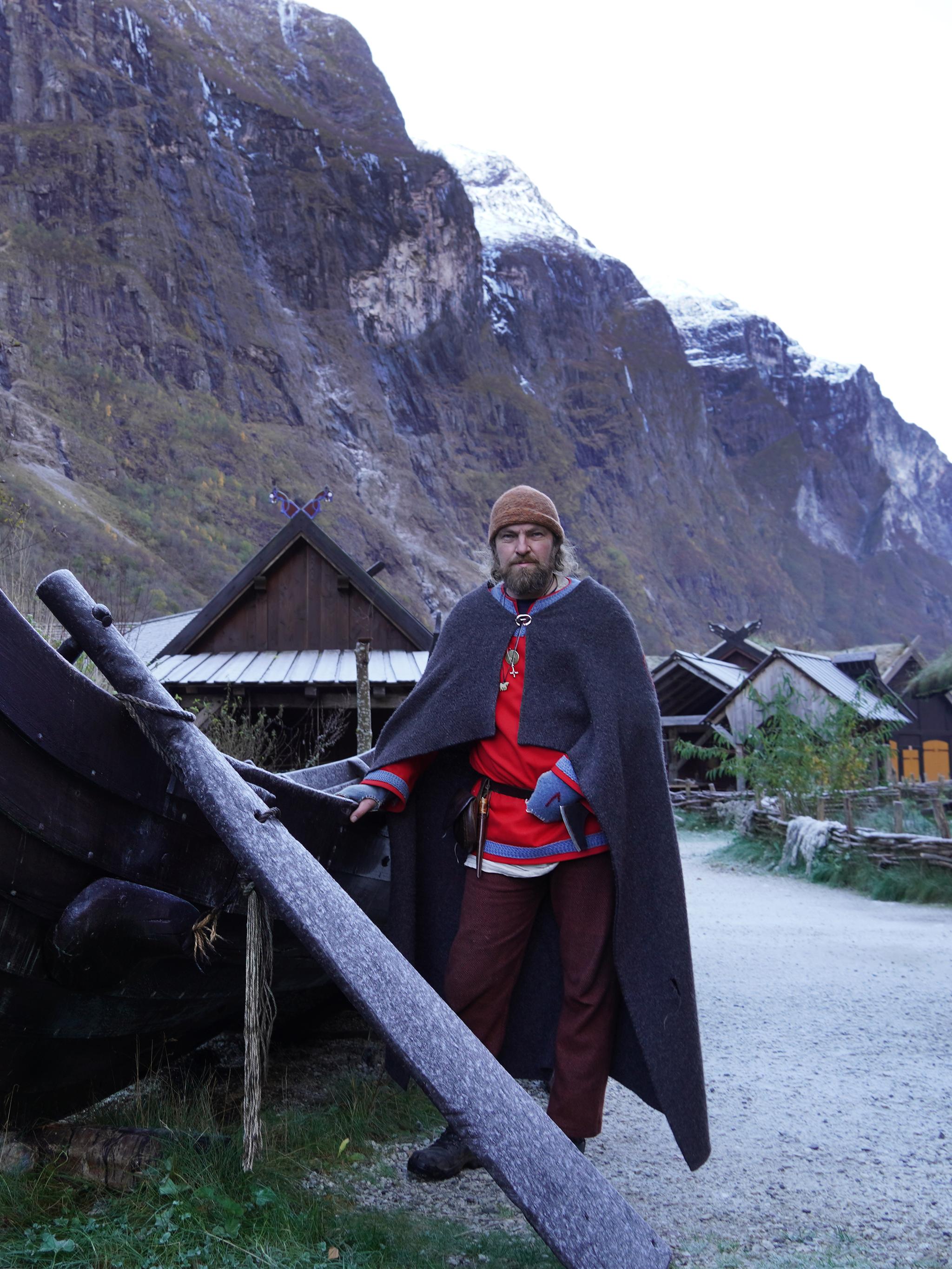 Viking in front of a viking ship in Viking Village in Gudvangen
