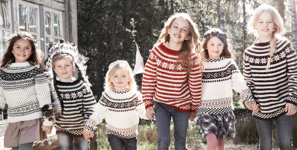 6 kids with striped woollen pullovers